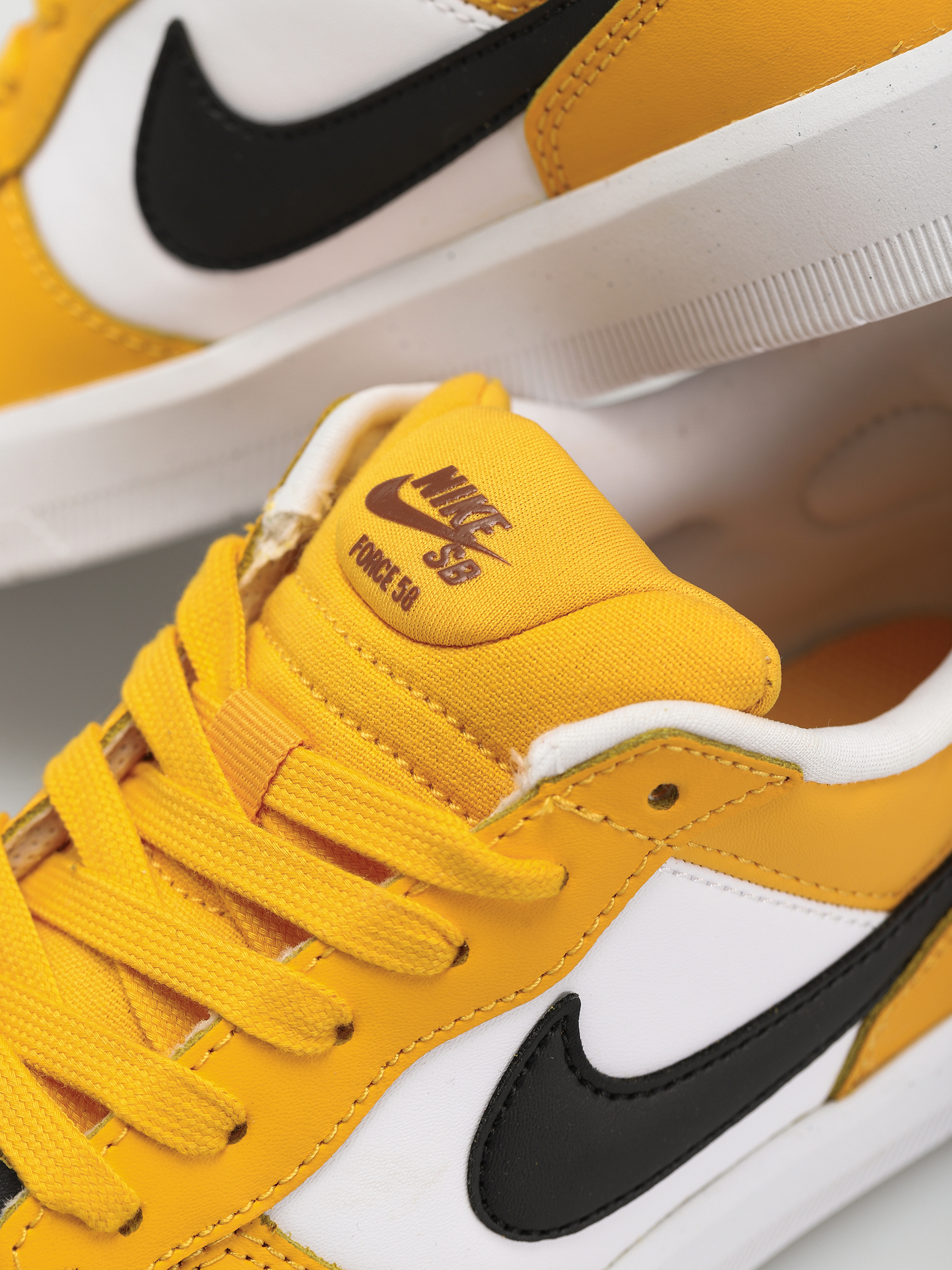 Nike SB Force 58 Premium Cipők (university gold/black white pecan)