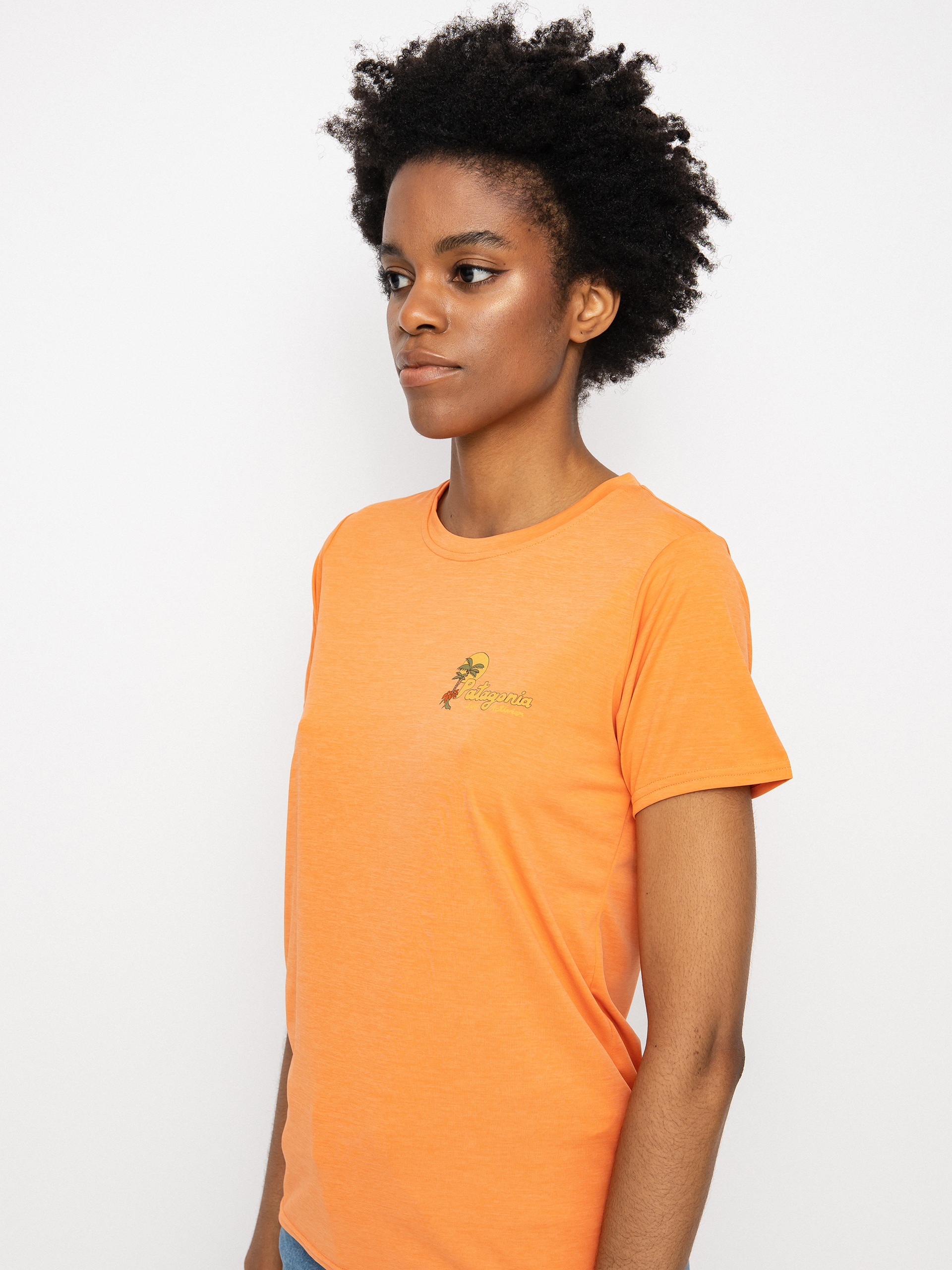 Patagonia Cap Cool Daily Graphic póló Wmn (palm protest tigerlily orange x-dye)