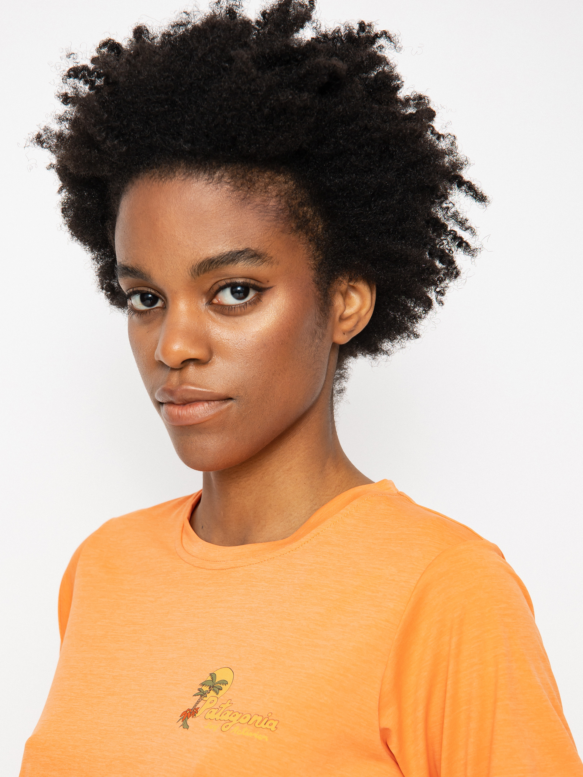 Patagonia Cap Cool Daily Graphic póló Wmn (palm protest tigerlily orange x-dye)