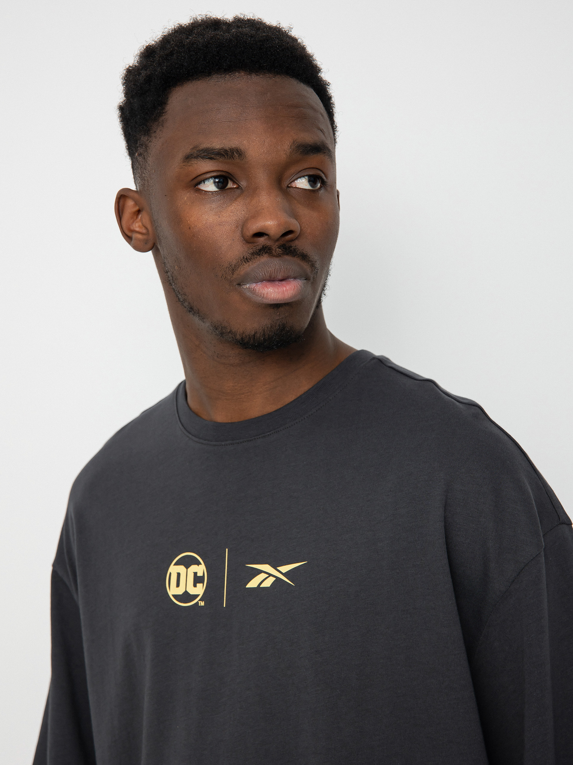 Reebok X DC B Vs J póló (purgry)