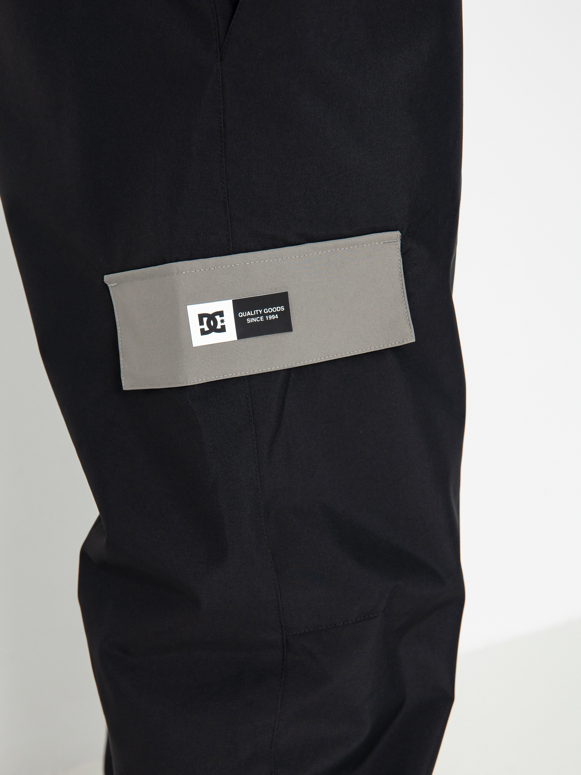 Férfi DC Docile Bib Snowboard nadrág (black)