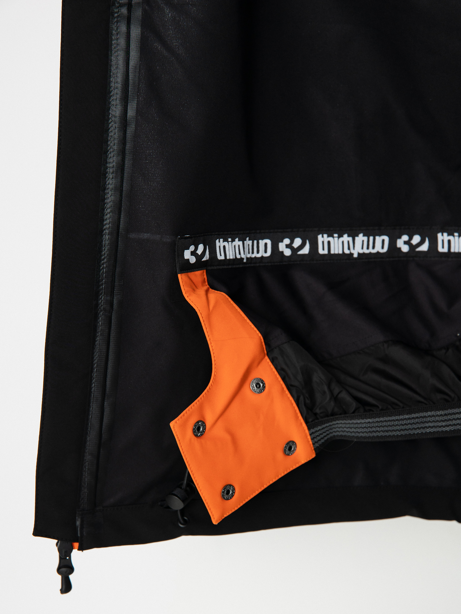 Férfi ThirtyTwo Grasser Snowboard dzseki (black/orange)