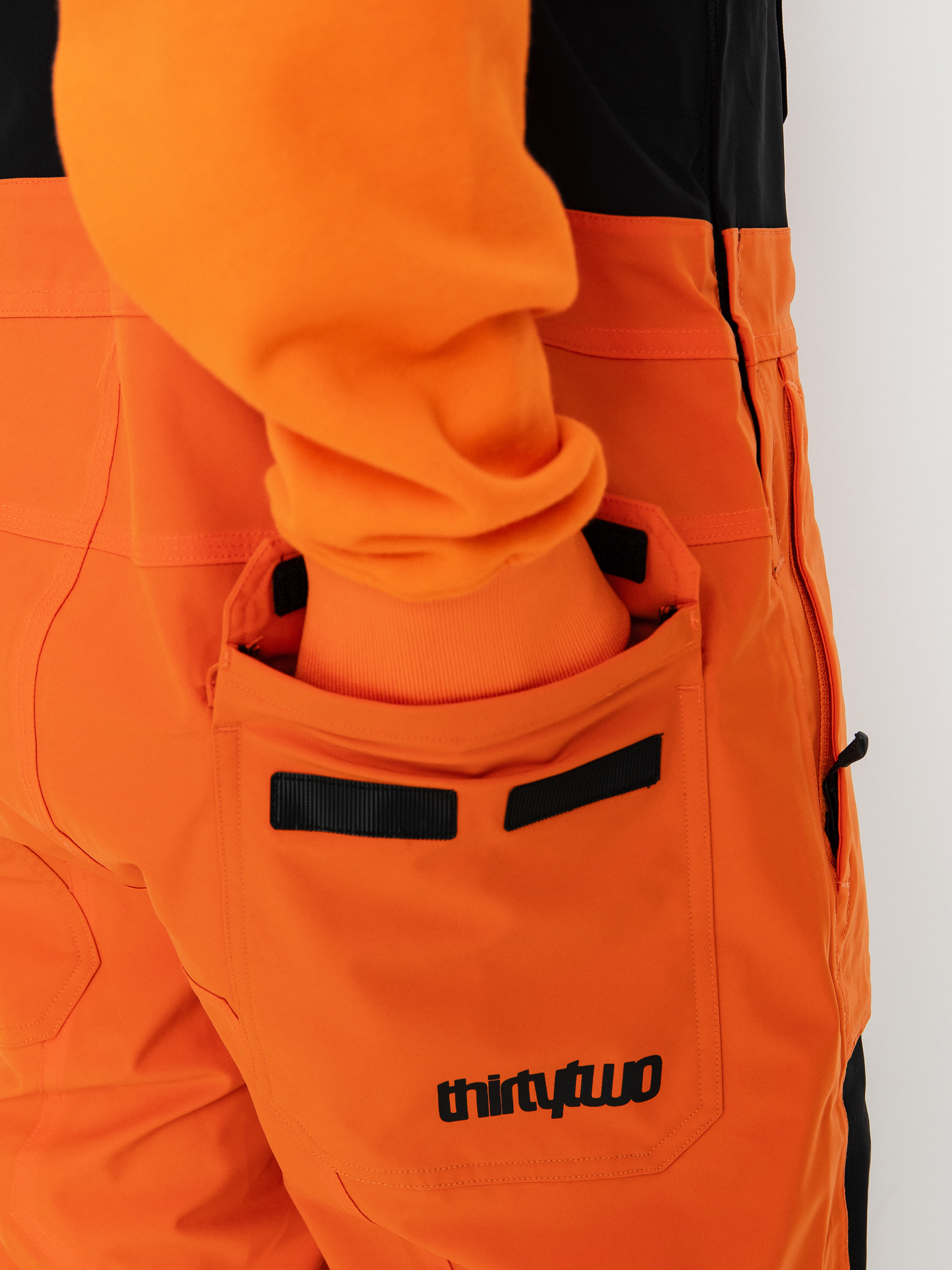 Férfi ThirtyTwo Basement Bib Snowboard nadrág (black/orange)