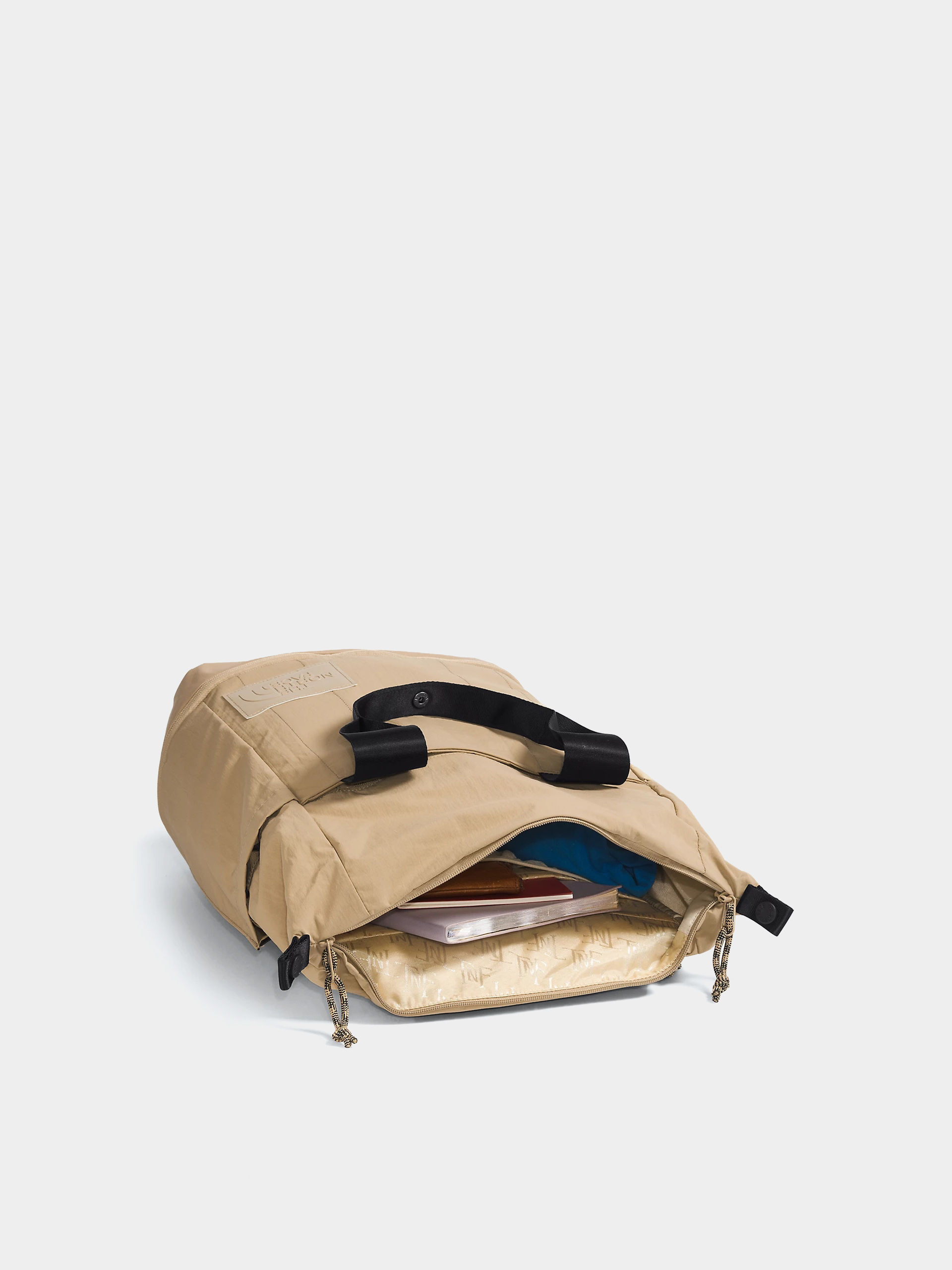 Hátizsák The North Face Never Stop Utility Pack Wmn (kelp tan/tnf black)