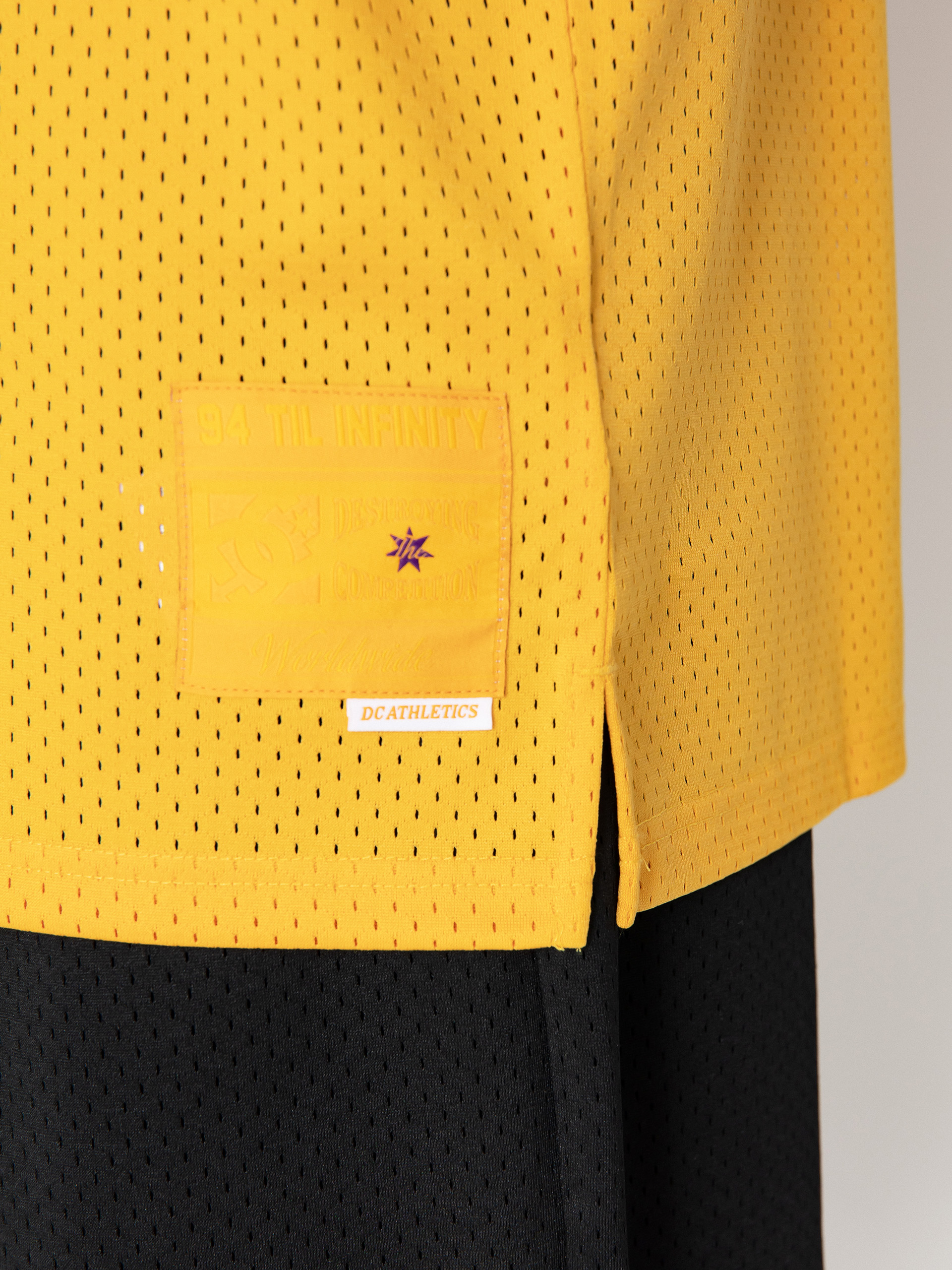 Póló DC Showtime (saffron)