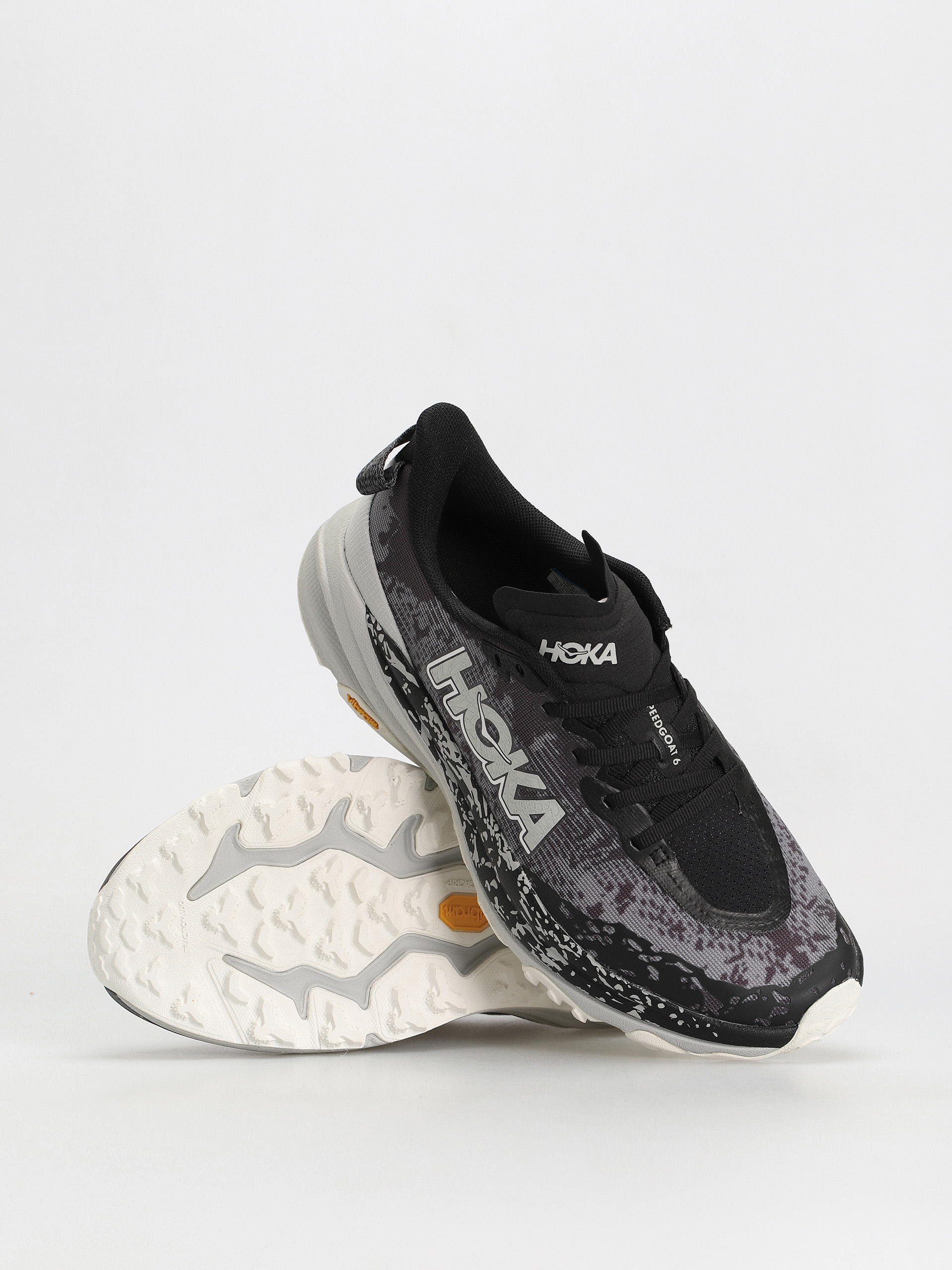 Hoka Speedgoat 6 Cipők (black/stardust)