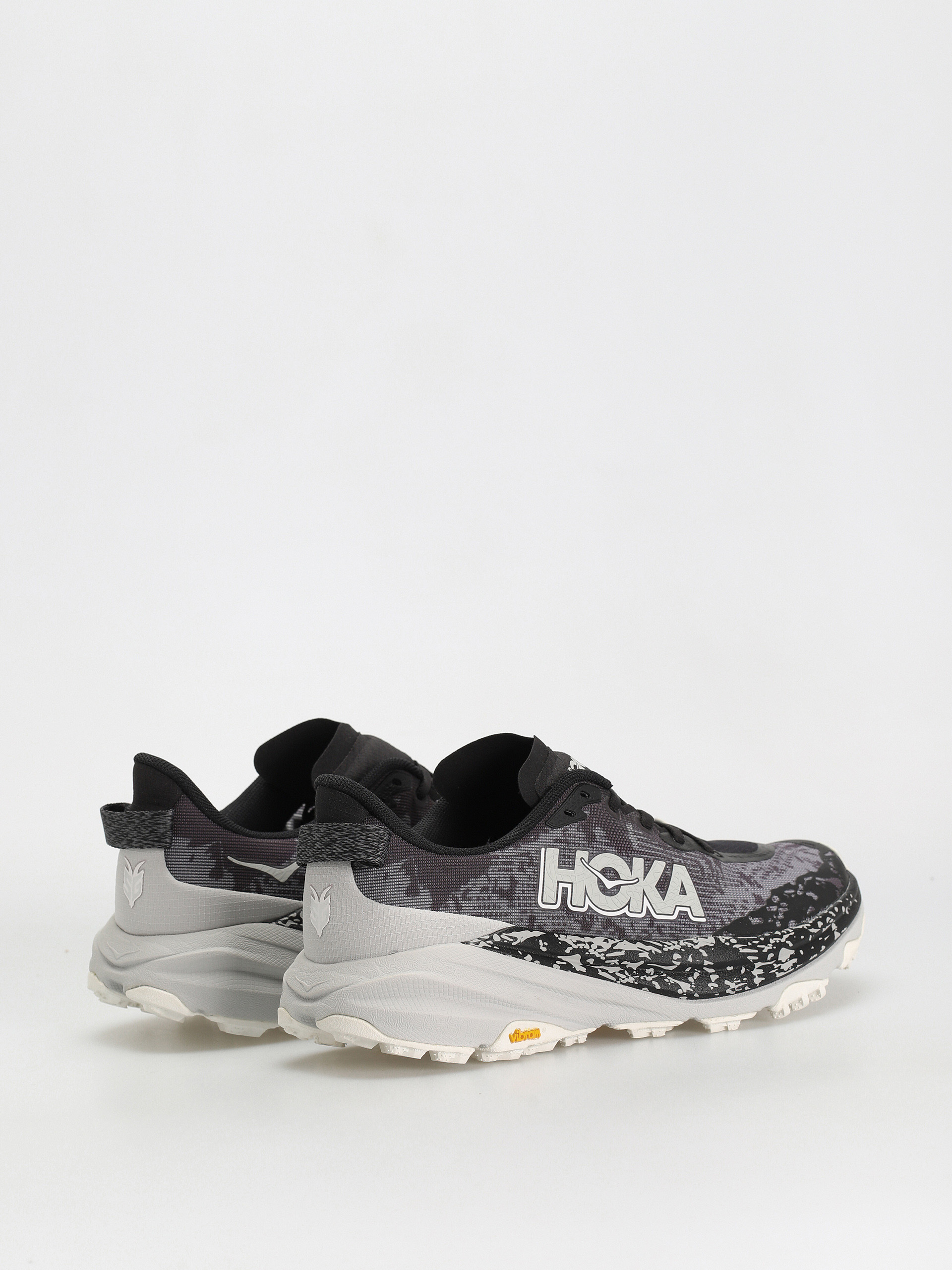 Hoka Speedgoat 6 Cipők (black/stardust)
