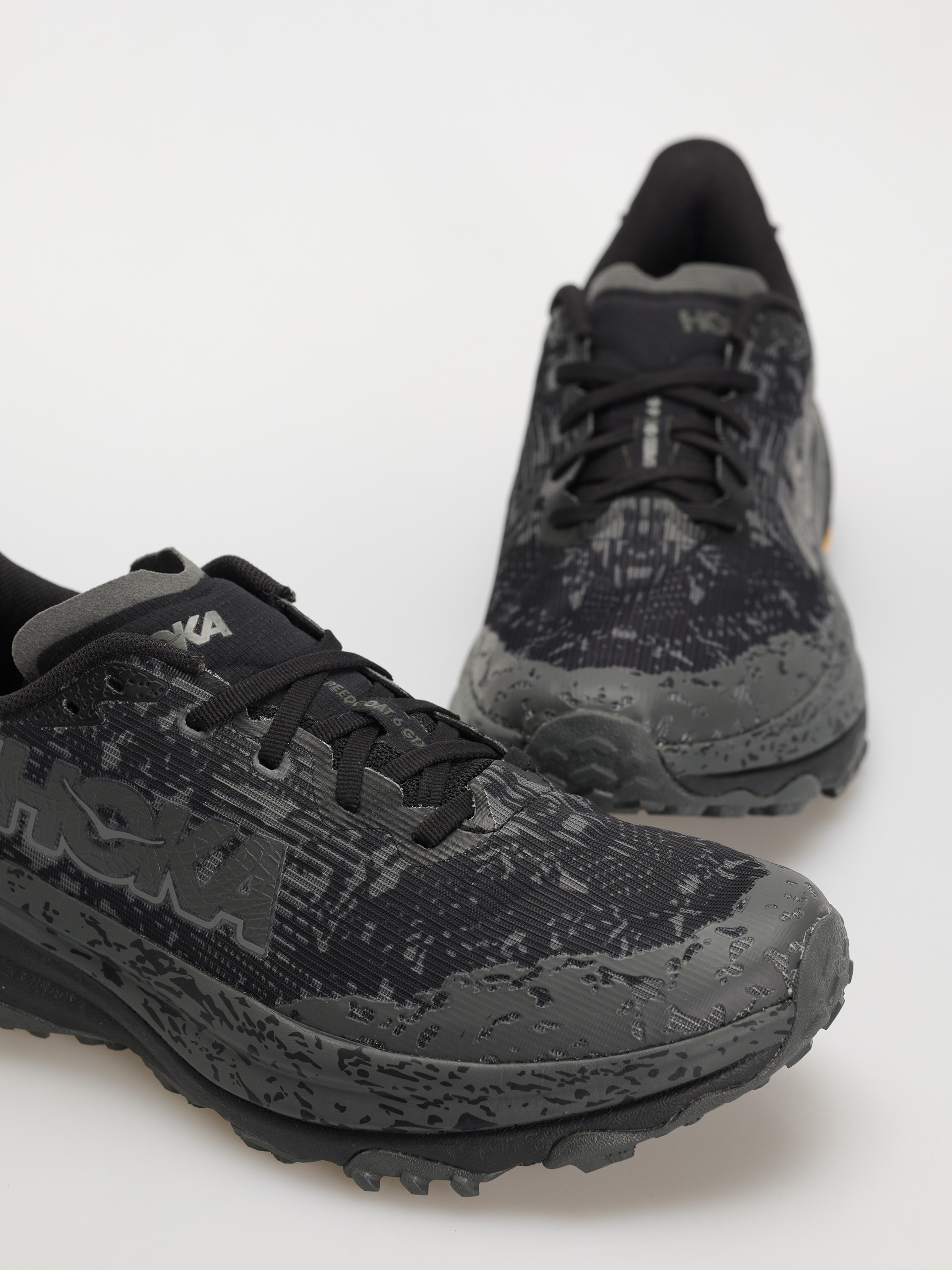 Hoka Speedgoat 6 Cipők (black/outer orbit)