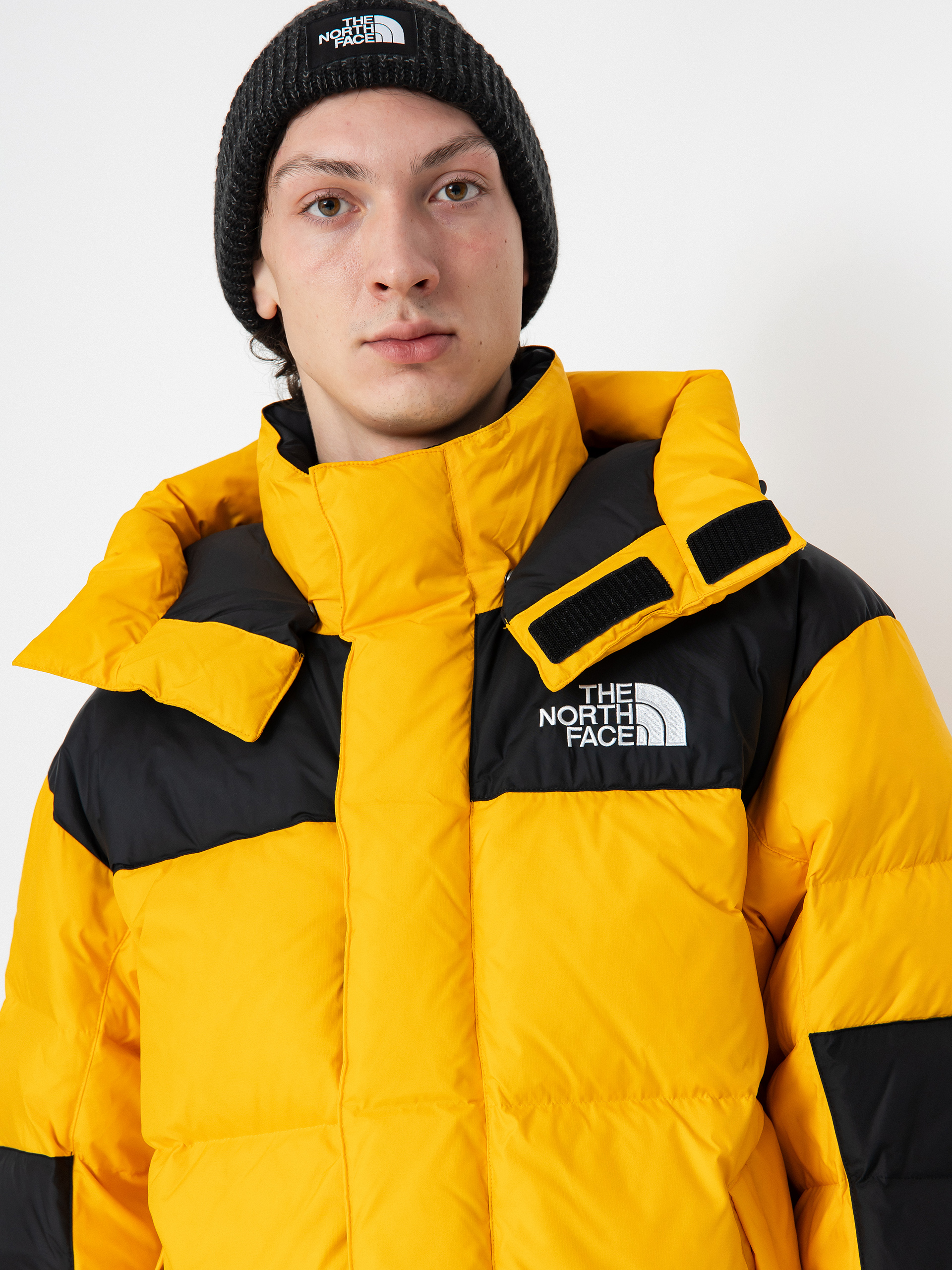 The North Face Hmlyn Baltoro Dzseki (summit gold tnf black n)