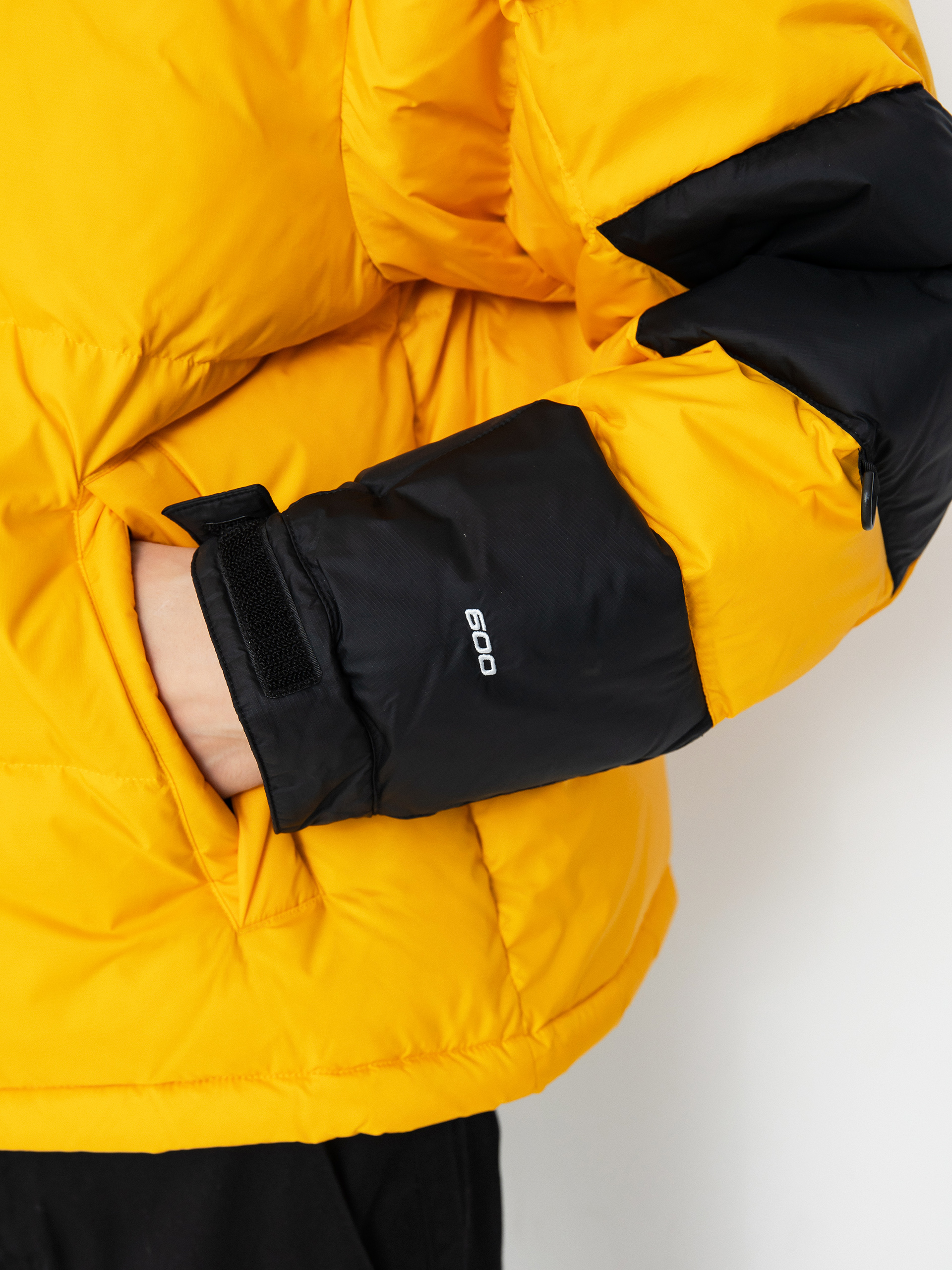 The North Face Hmlyn Baltoro Dzseki (summit gold tnf black n)