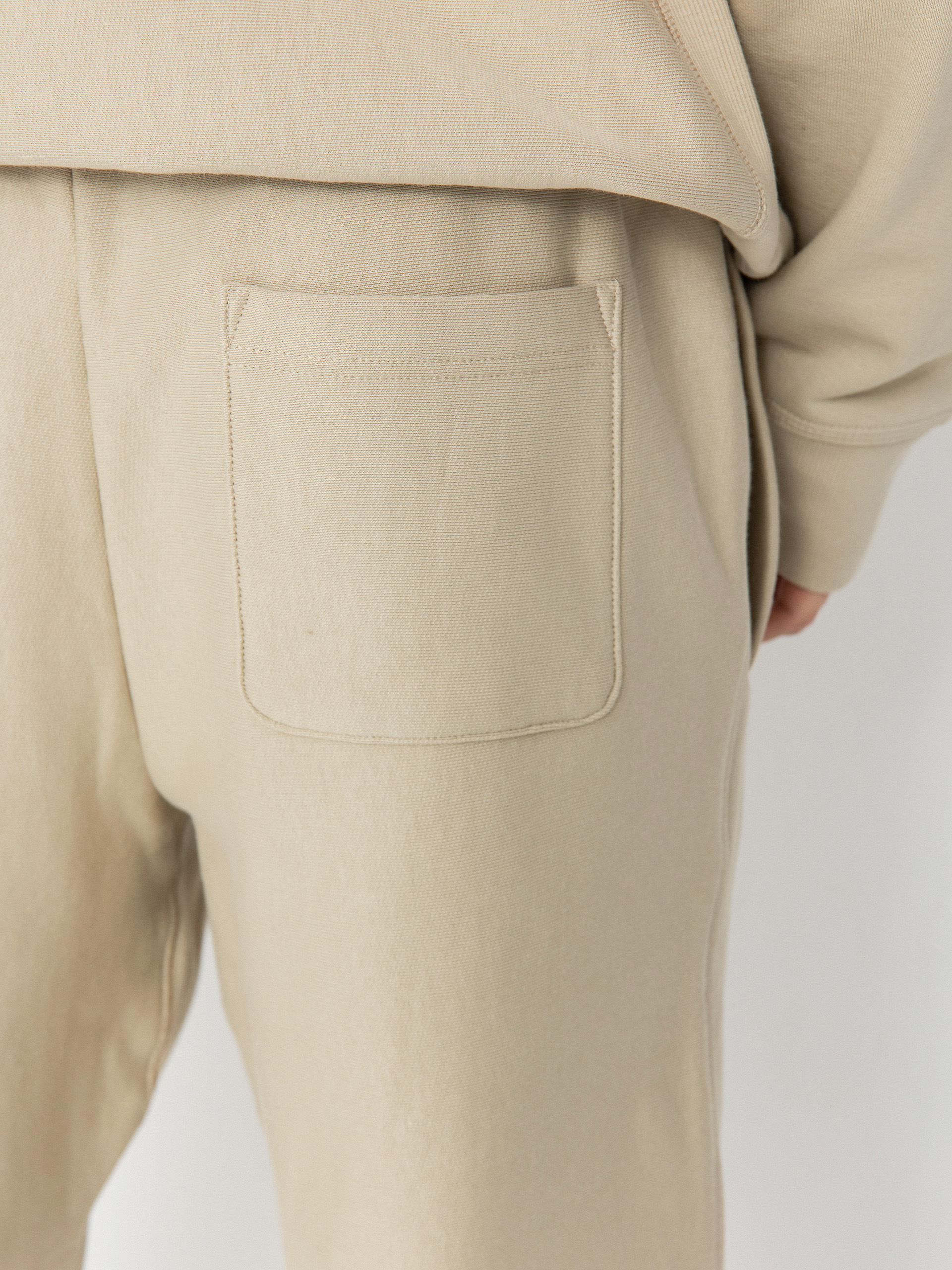 Kisnadrág Carhartt WIP American Script Jogging (fleur de sel)