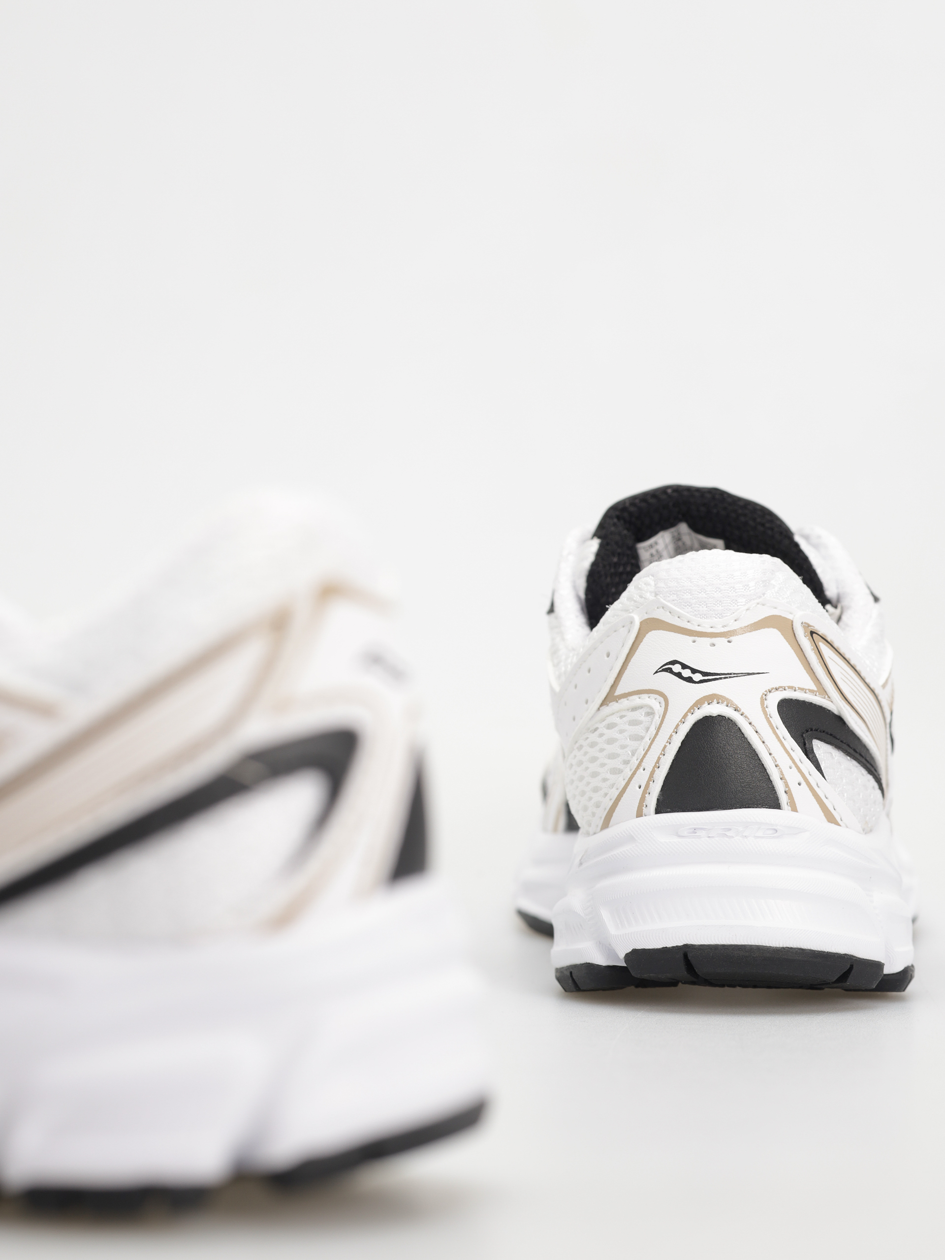 Saucony Ride Millennium Cipők (wht/gold/black)