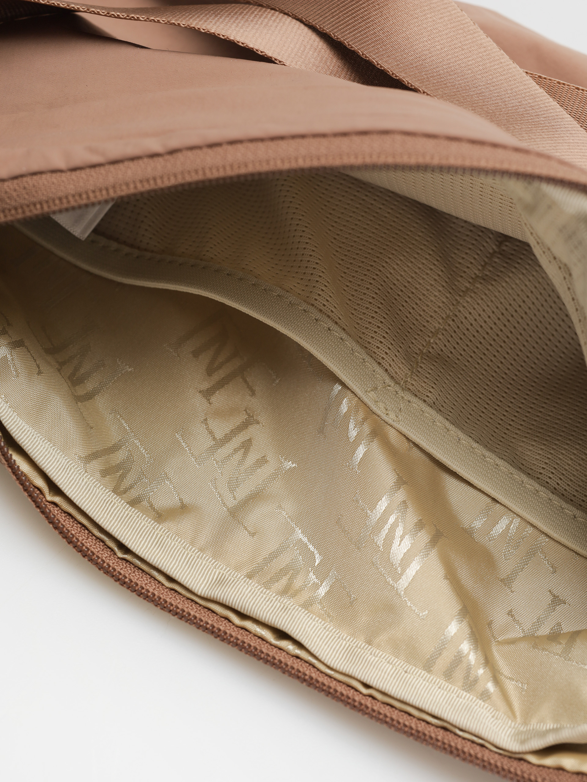 The North Face Never Stop Crossbody Wmn Kézitáska (latte)