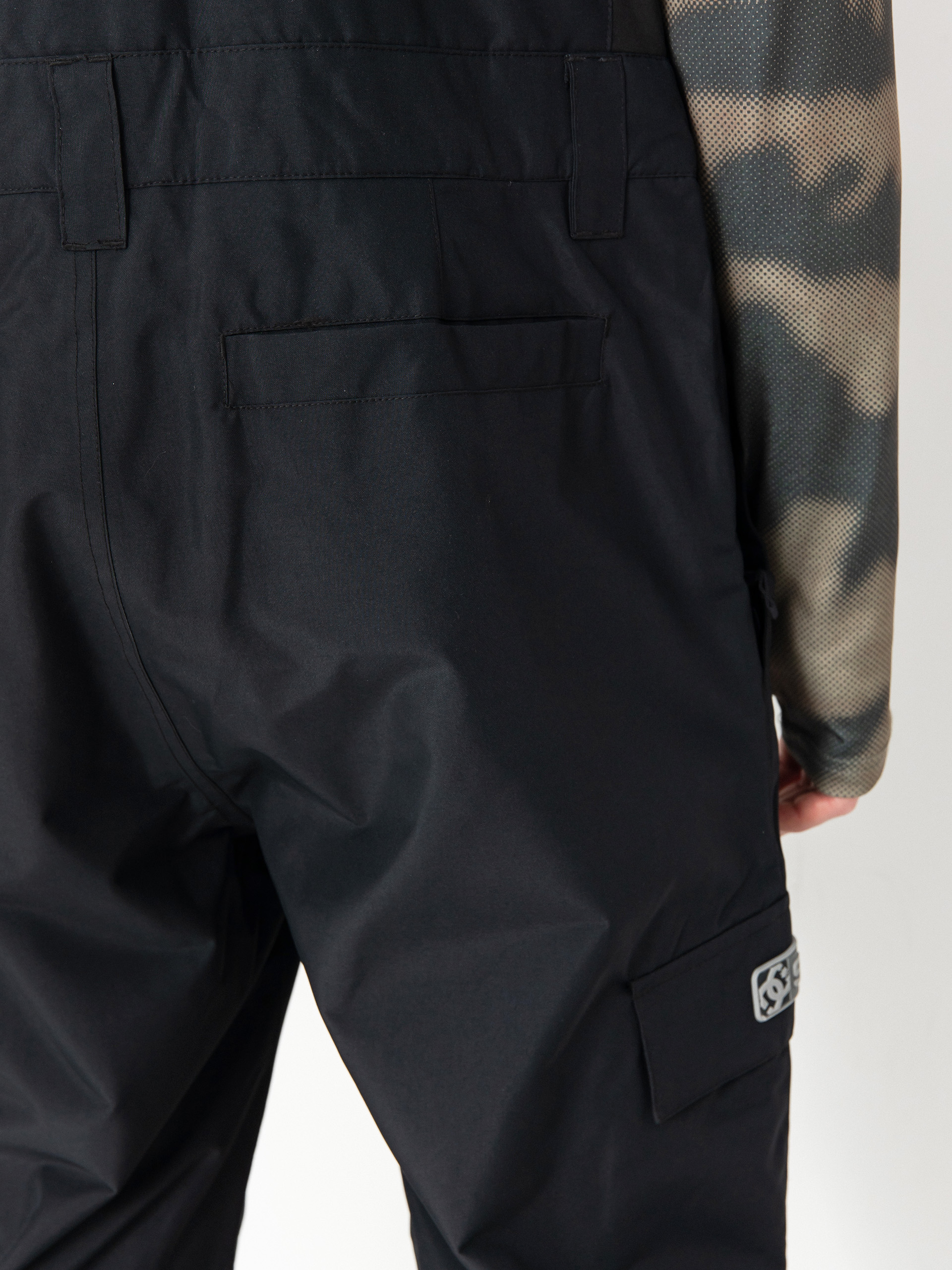 Férfi DC Docile Bib Snowboard nadrág (black)