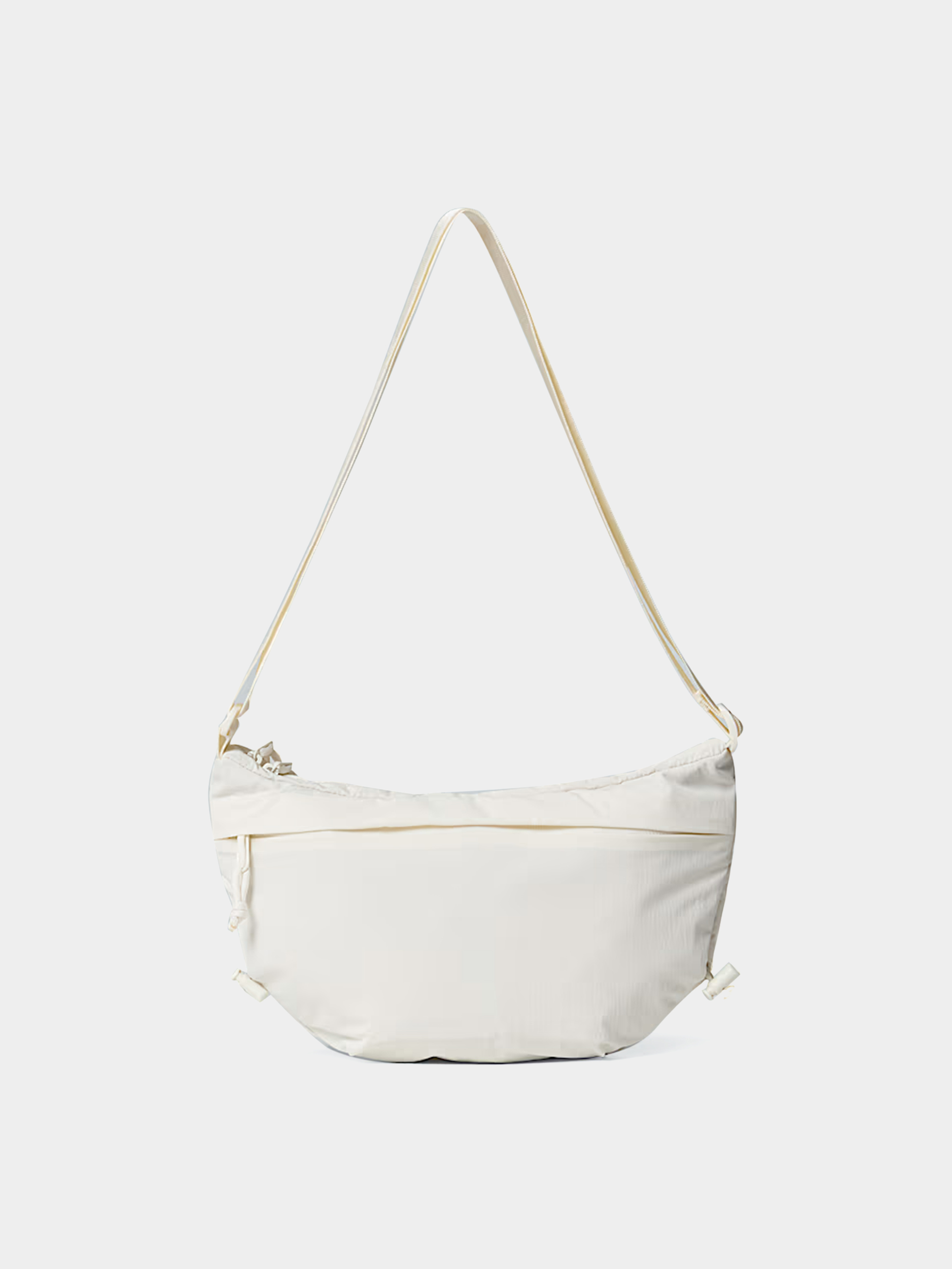 Kézitáska The North Face Never Stop Crossbody Wmn (white dune)