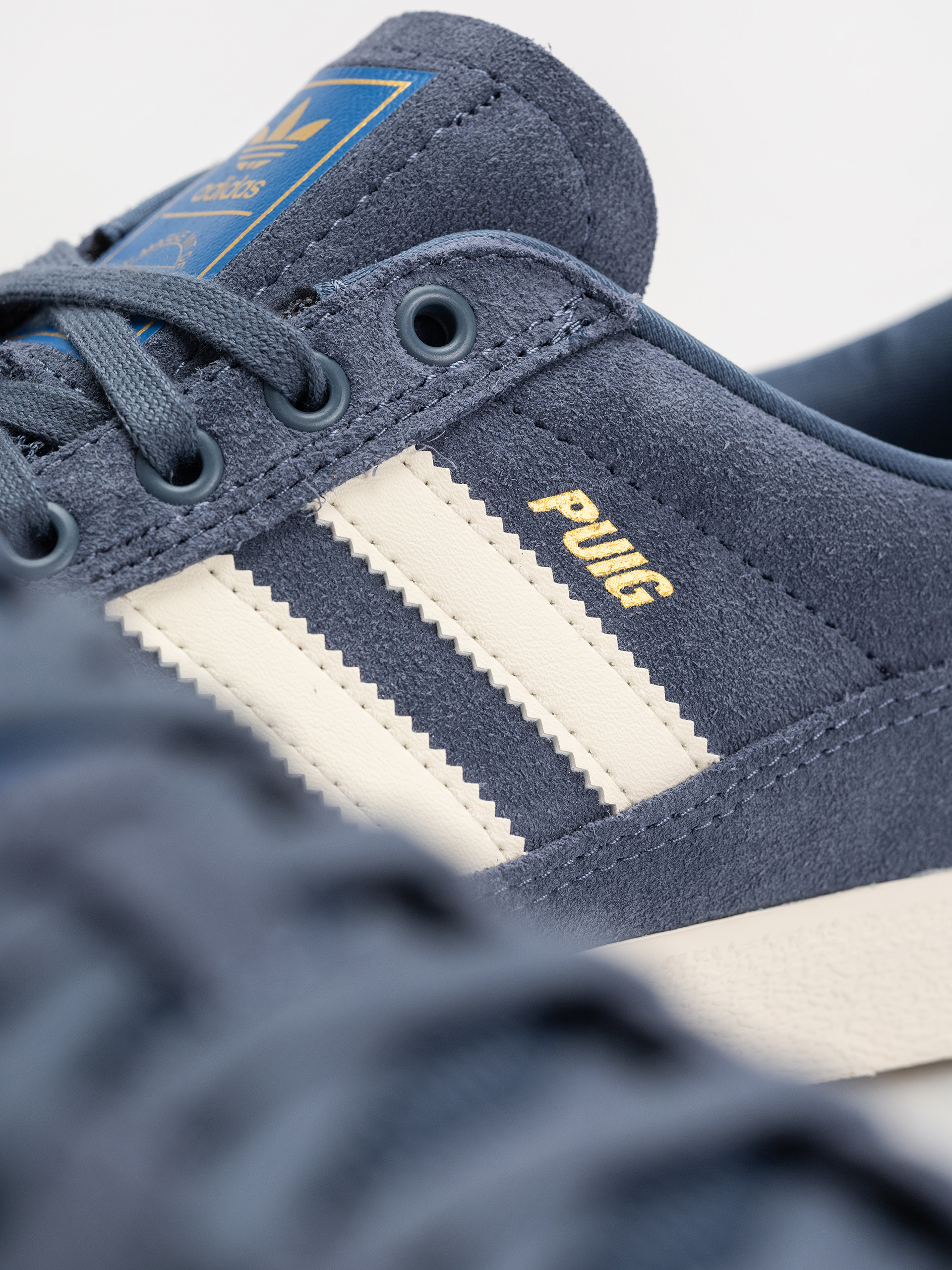 adidas Puig Indoor Cipők (prloin/owhite/blubir)