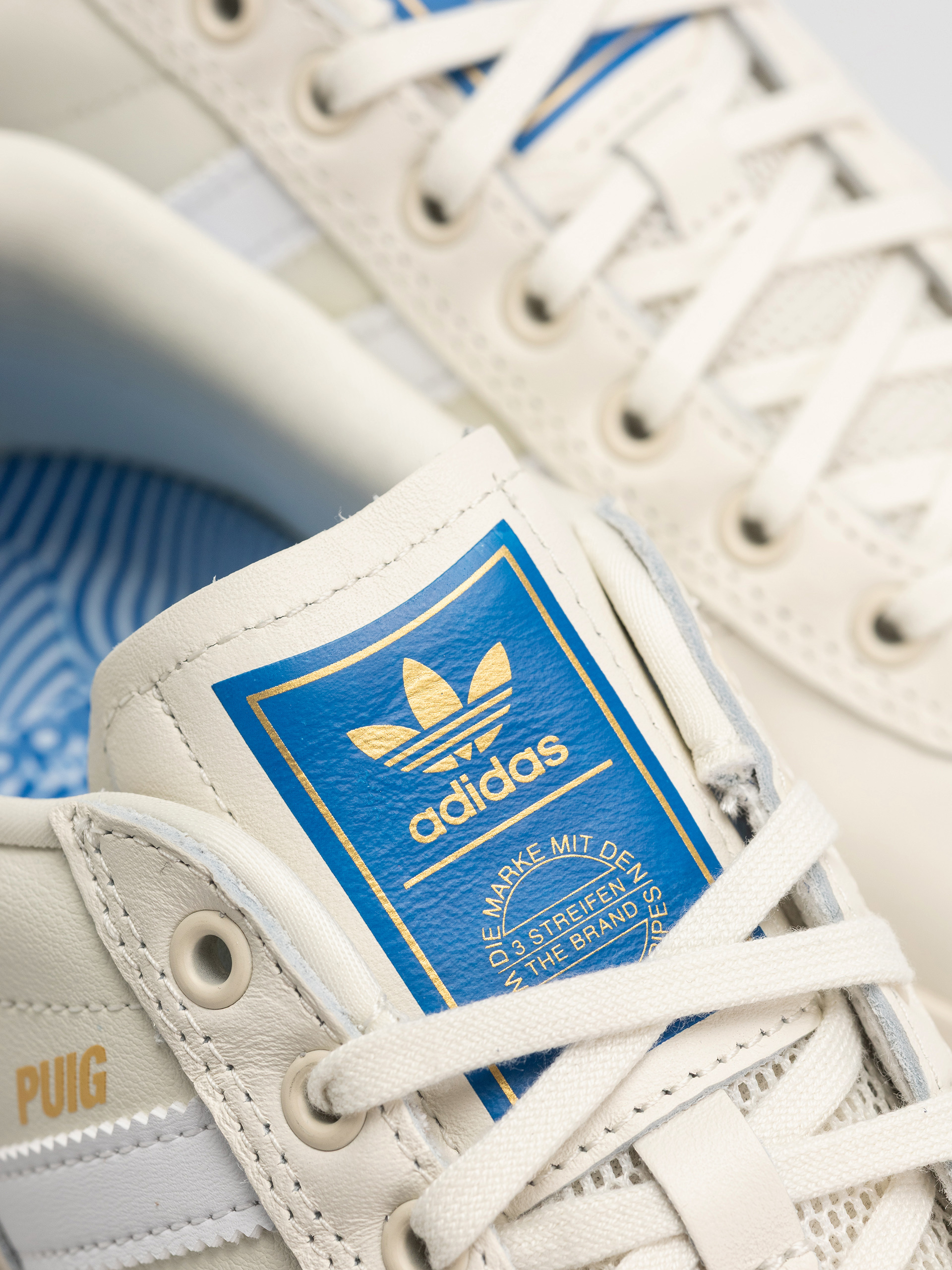 adidas Puig Indoor Cipők (owhite/ftwwht/blubir)