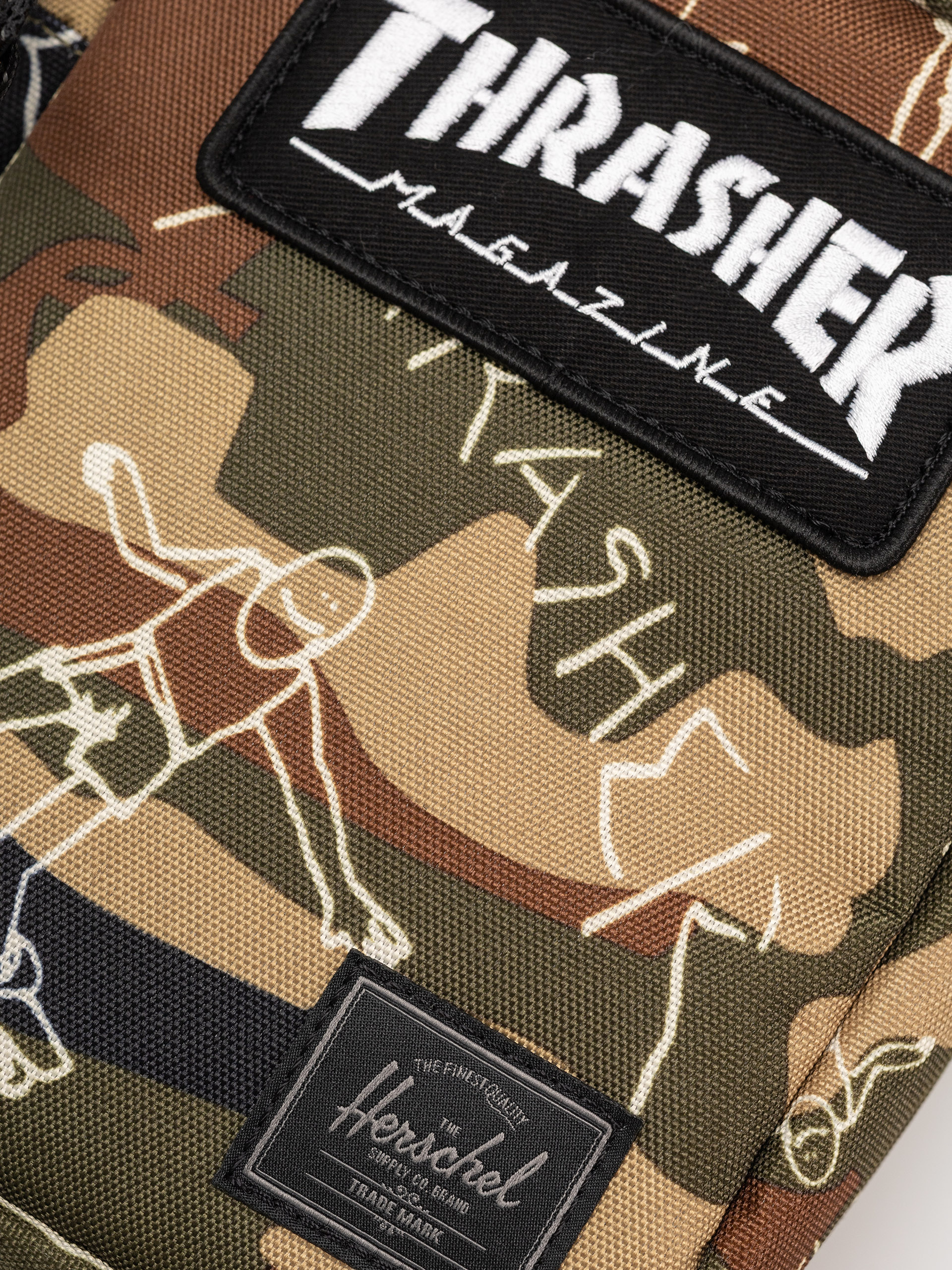 Herschel Supply Co. X Thrasher Gonz Heritage Crossbody Táska (woodland camo)