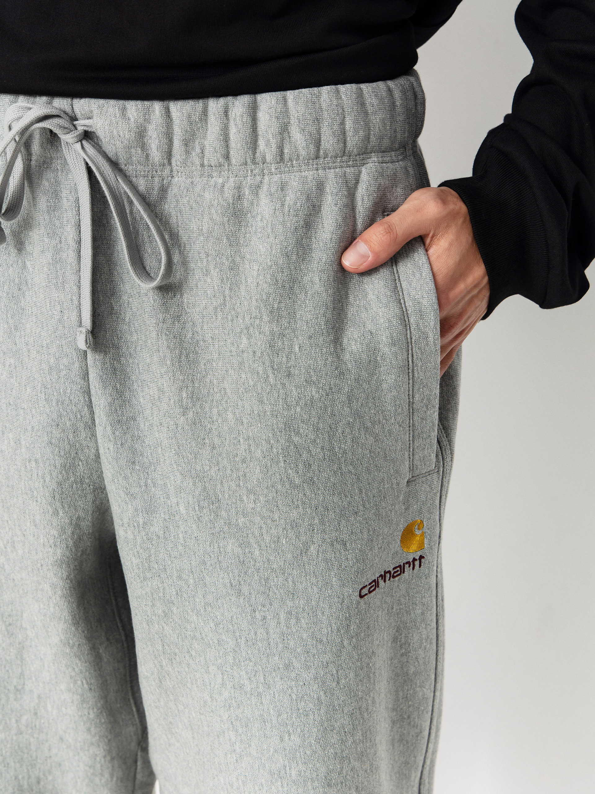 Kisnadrág Carhartt WIP American Script Jogging (grey heather)