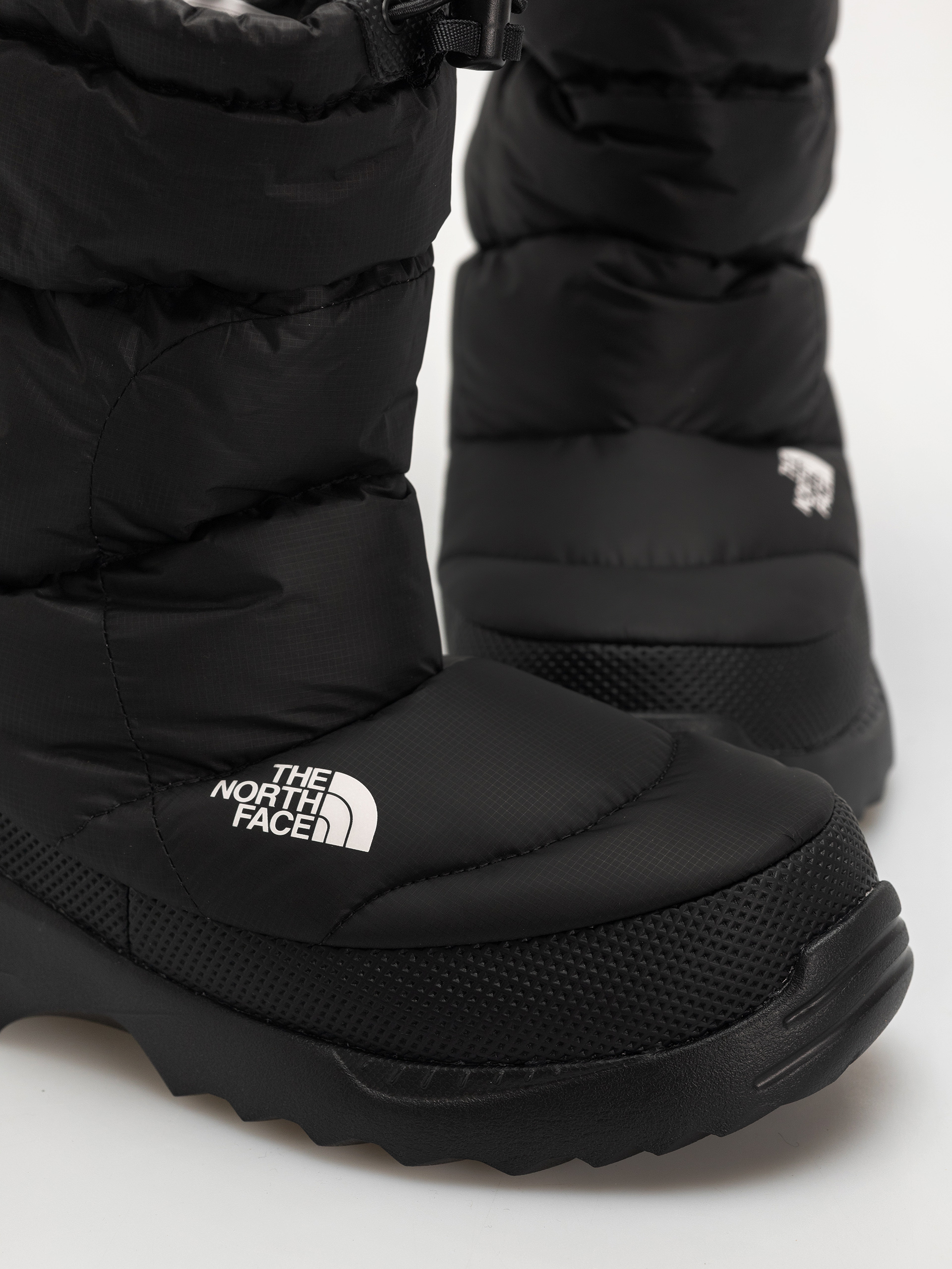 Cipők The North Face Nuptse Traction Bootie (tnf black/tnf black)