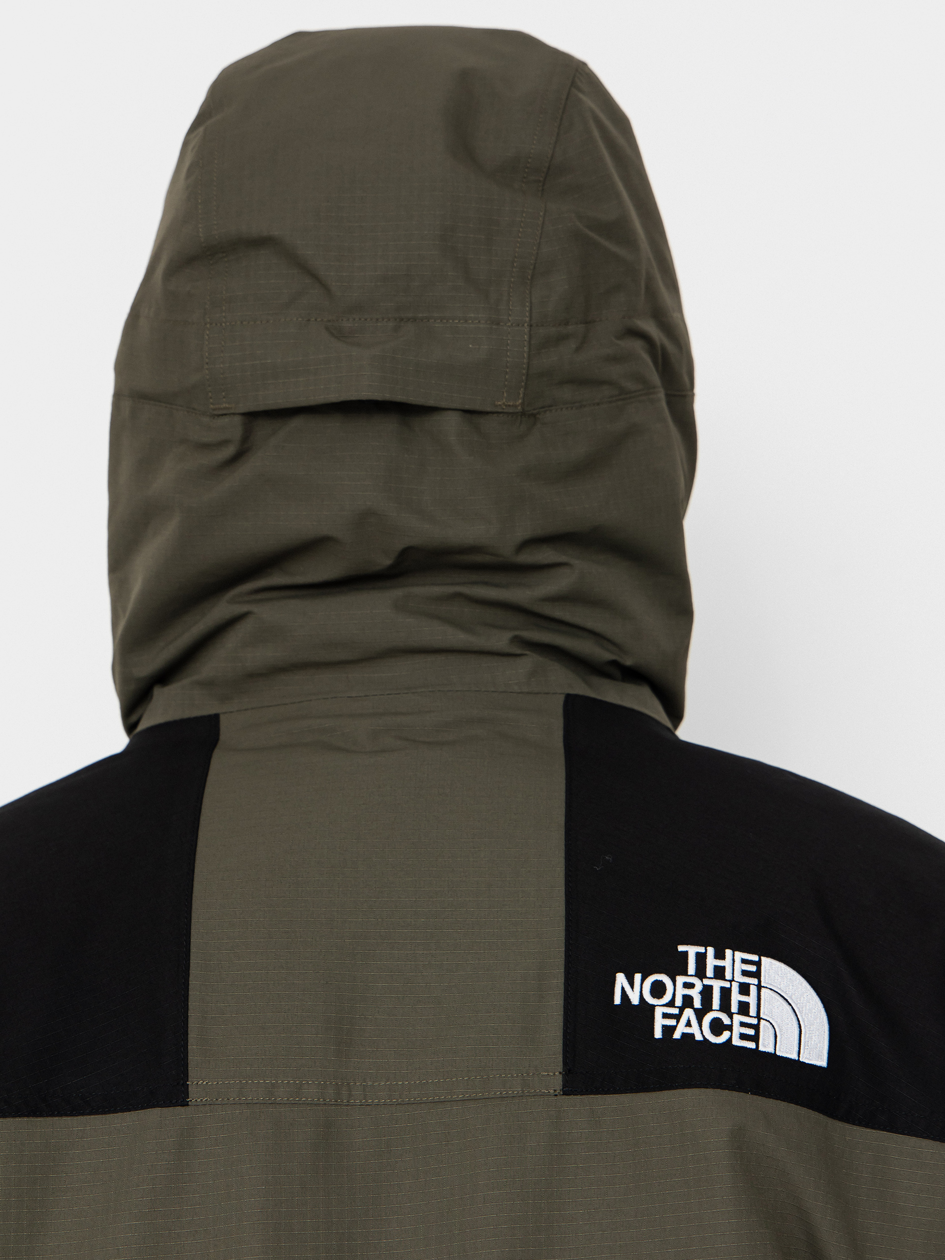 Dzseki The North Face Mountain Down (new taupe green/tnf black)