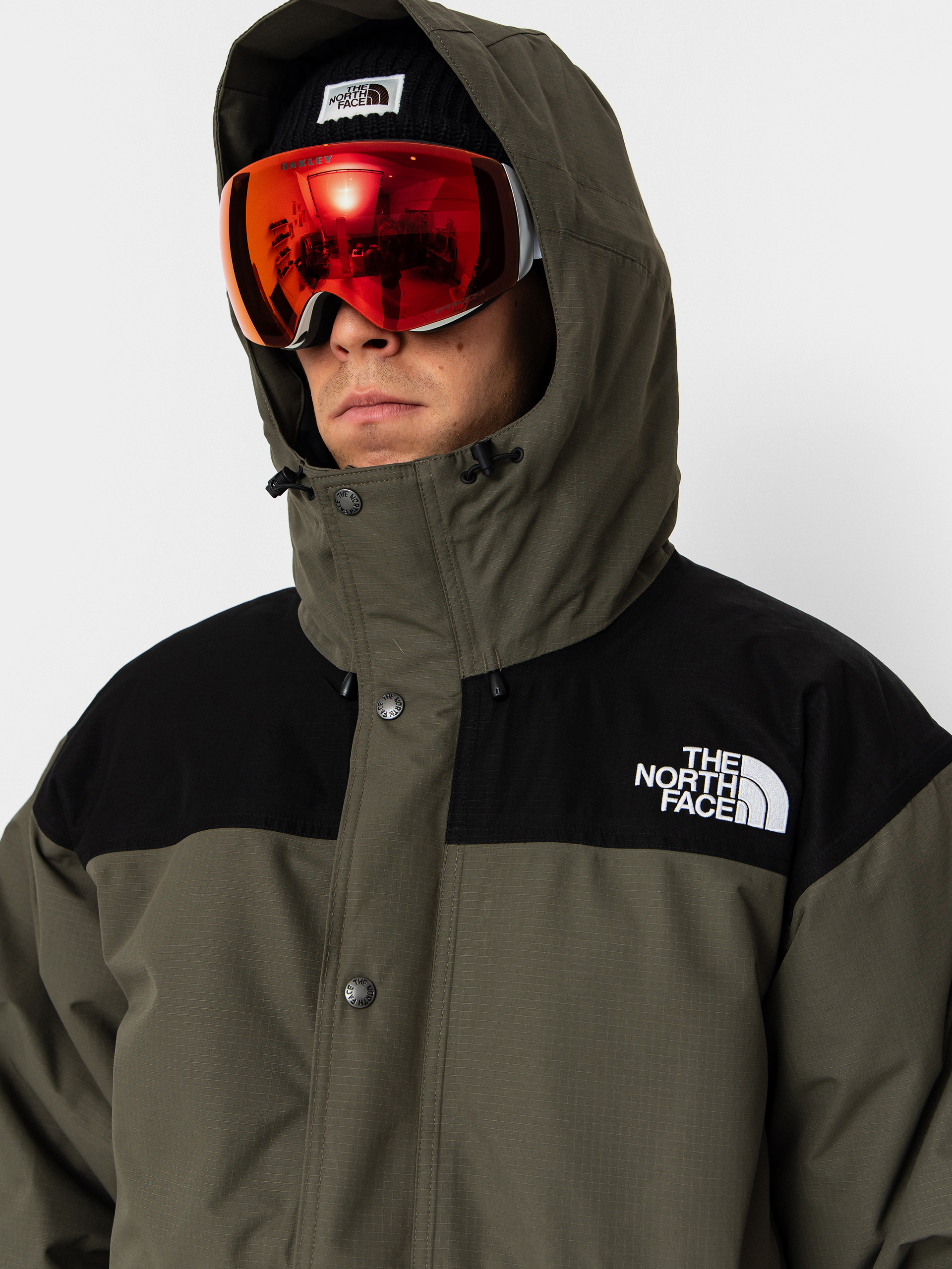 Dzseki The North Face Mountain Down (new taupe green/tnf black)