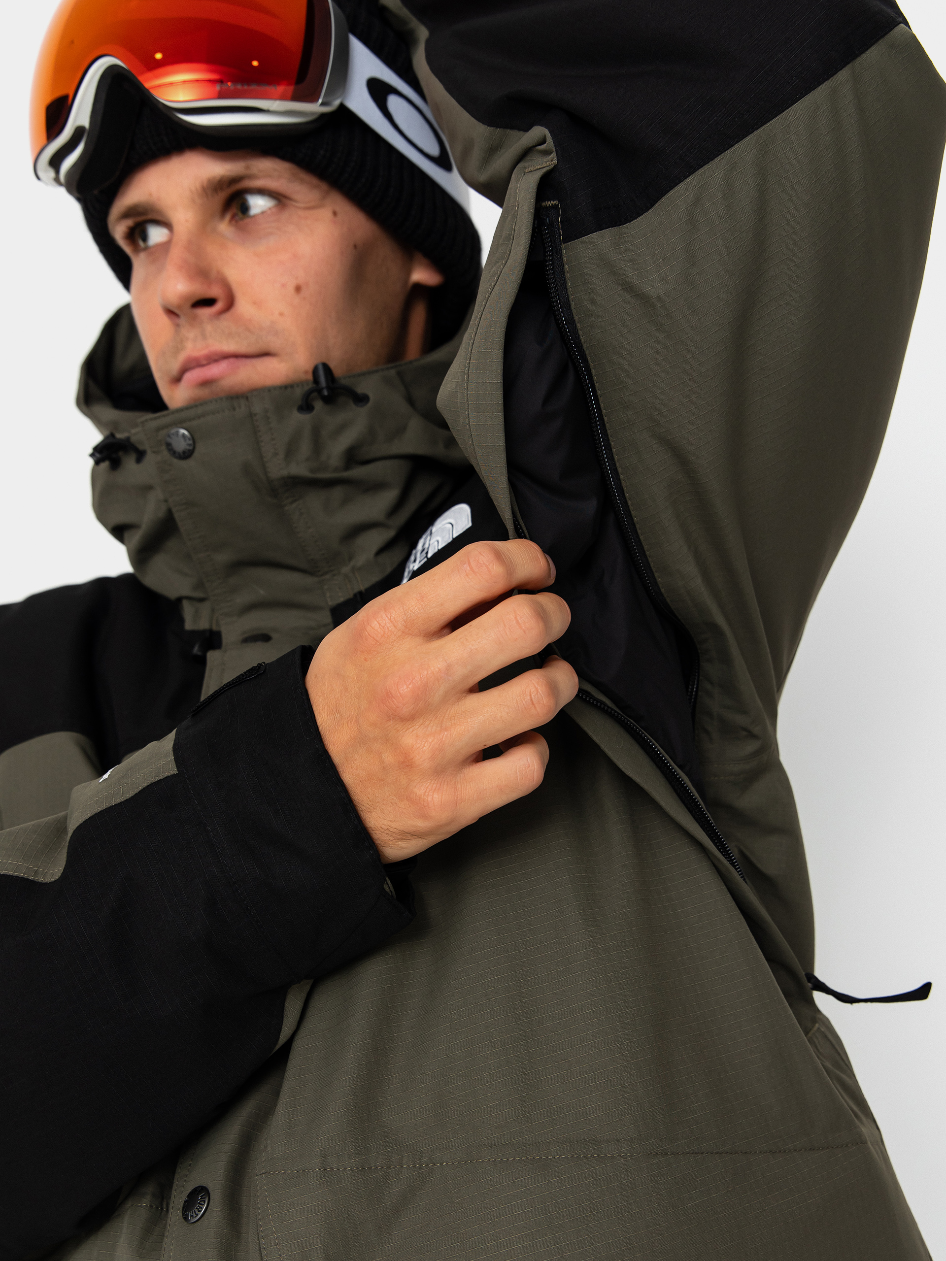 Dzseki The North Face Mountain Down (new taupe green/tnf black)