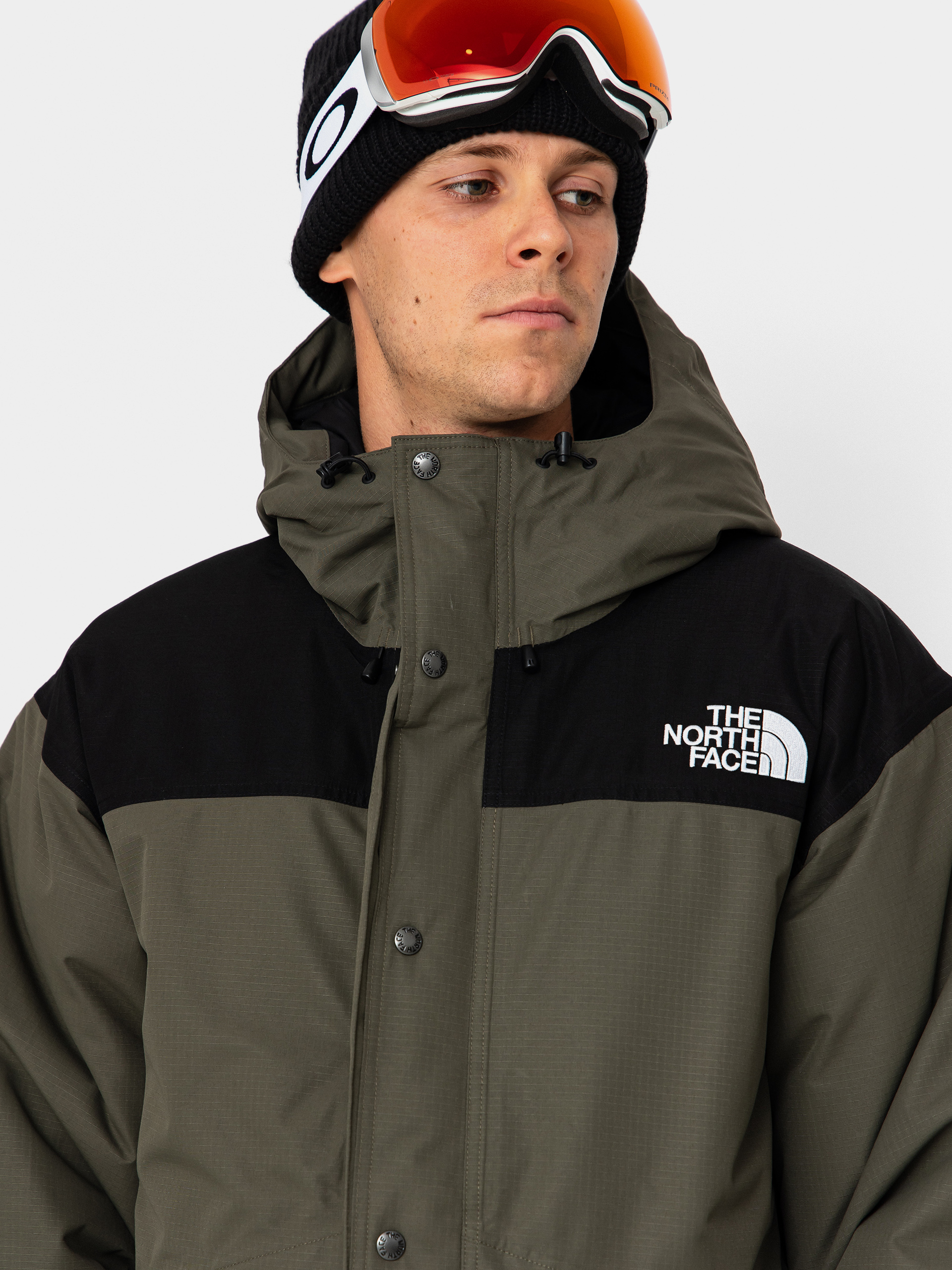 Dzseki The North Face Mountain Down (new taupe green/tnf black)