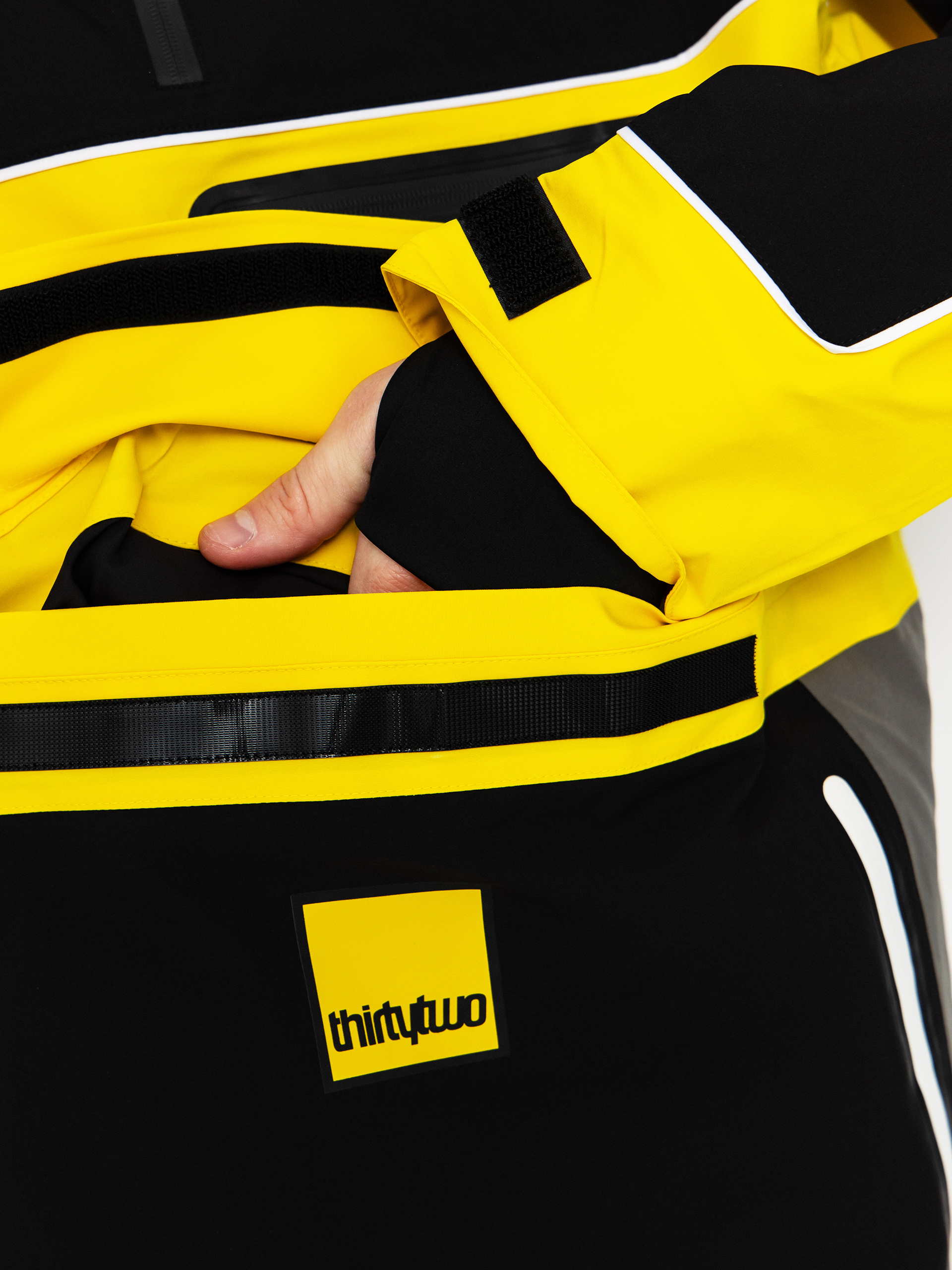 Férfi Snowboard dzseki ThirtyTwo Light Anorak (black/yellow)