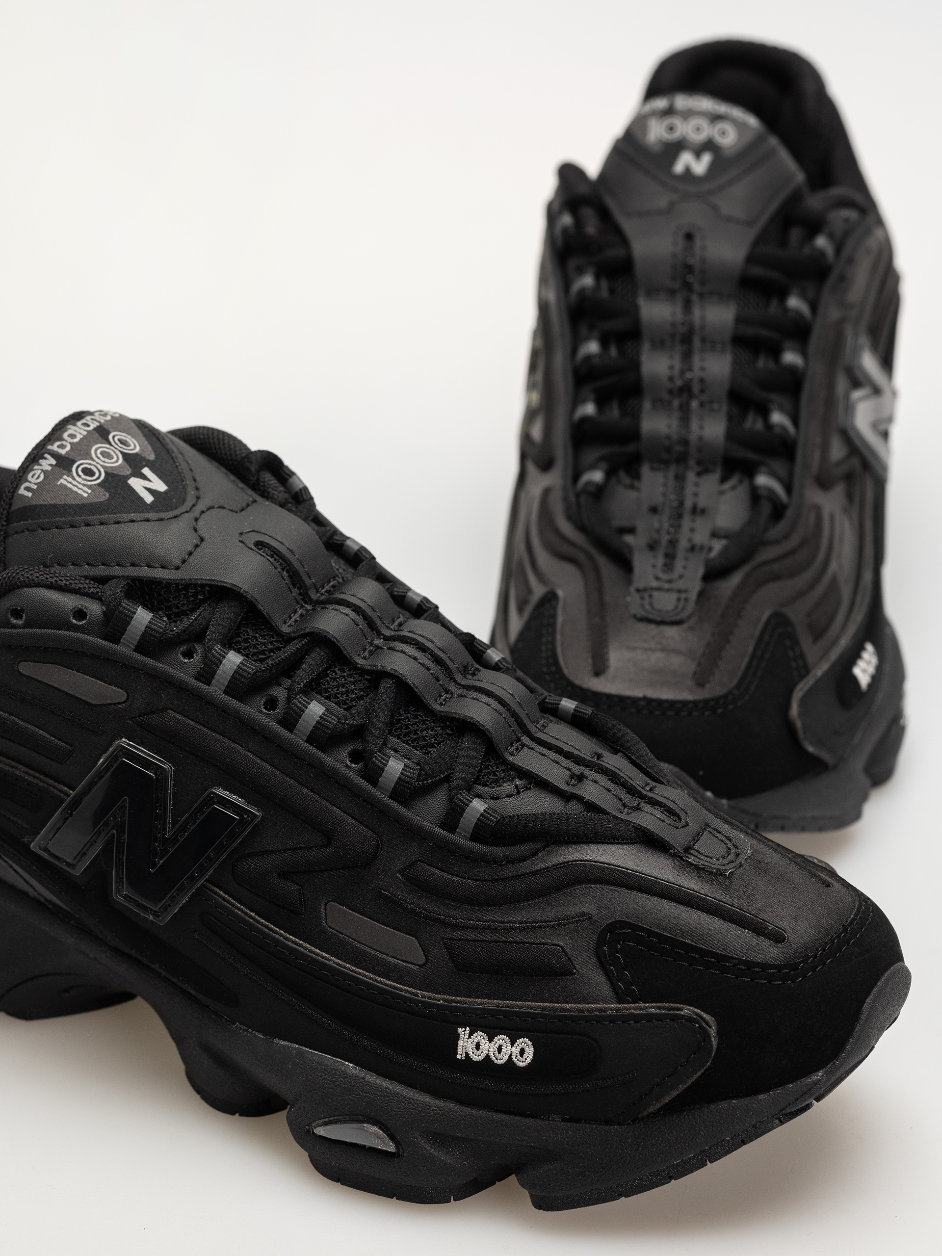 New Balance 1000 Cipők (black/black metallic/light gold metallic b)