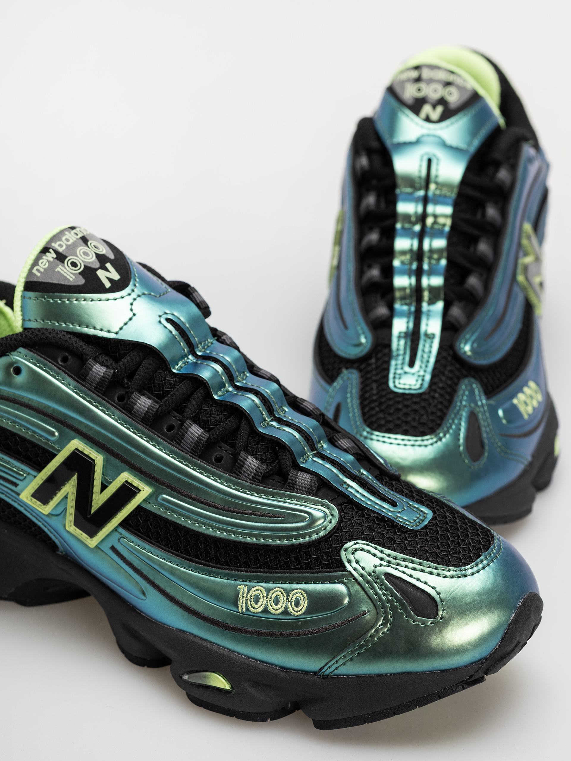 New Balance 1000 Cipők (faded black/afterglow)