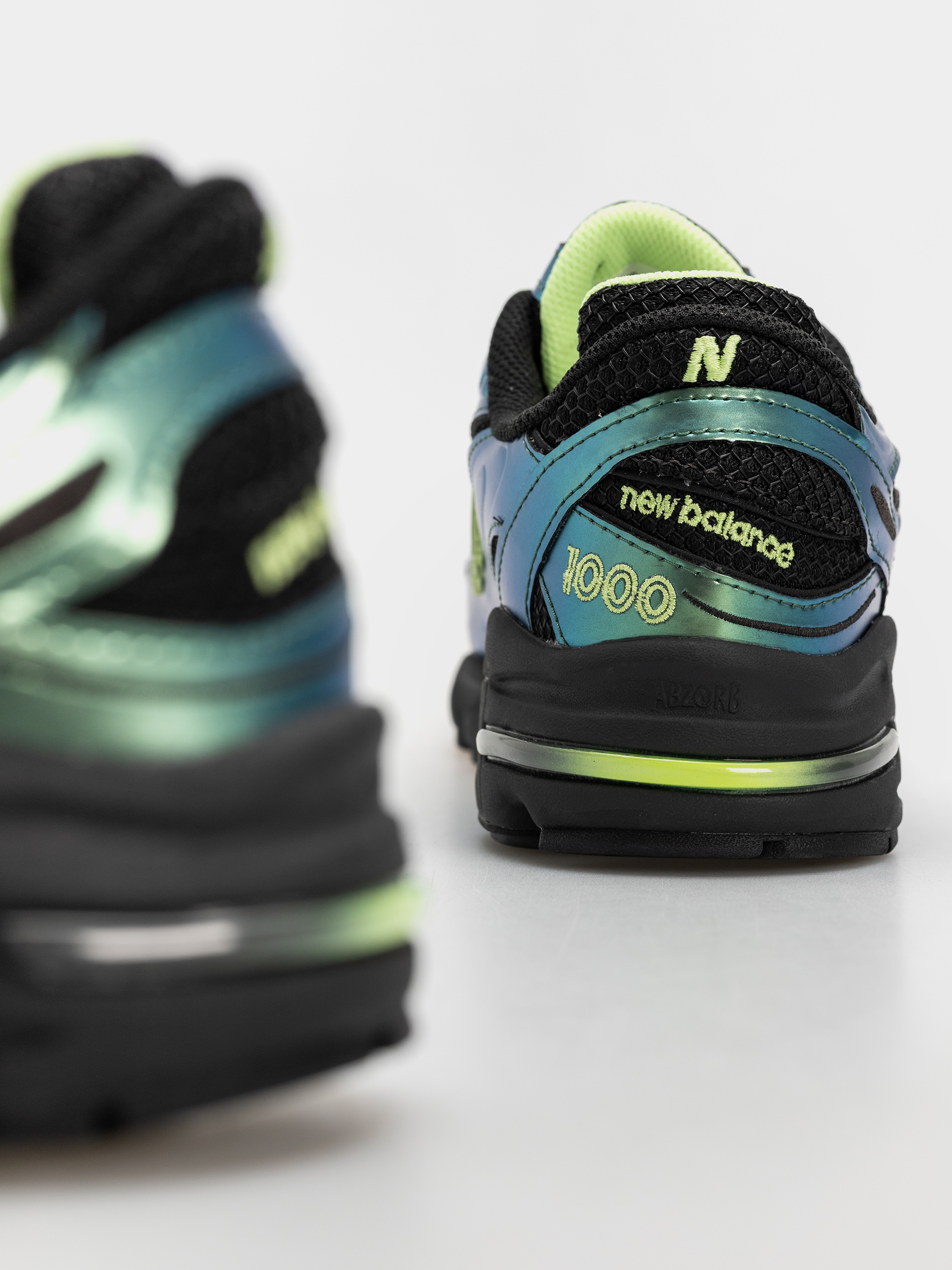 New Balance 1000 Cipők (faded black/afterglow)
