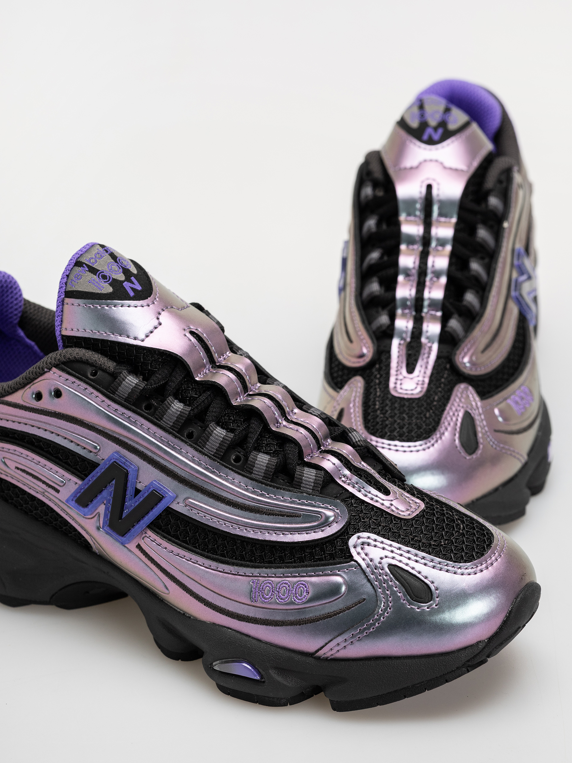 New Balance 1000 Cipők (faded black/electric indigo)