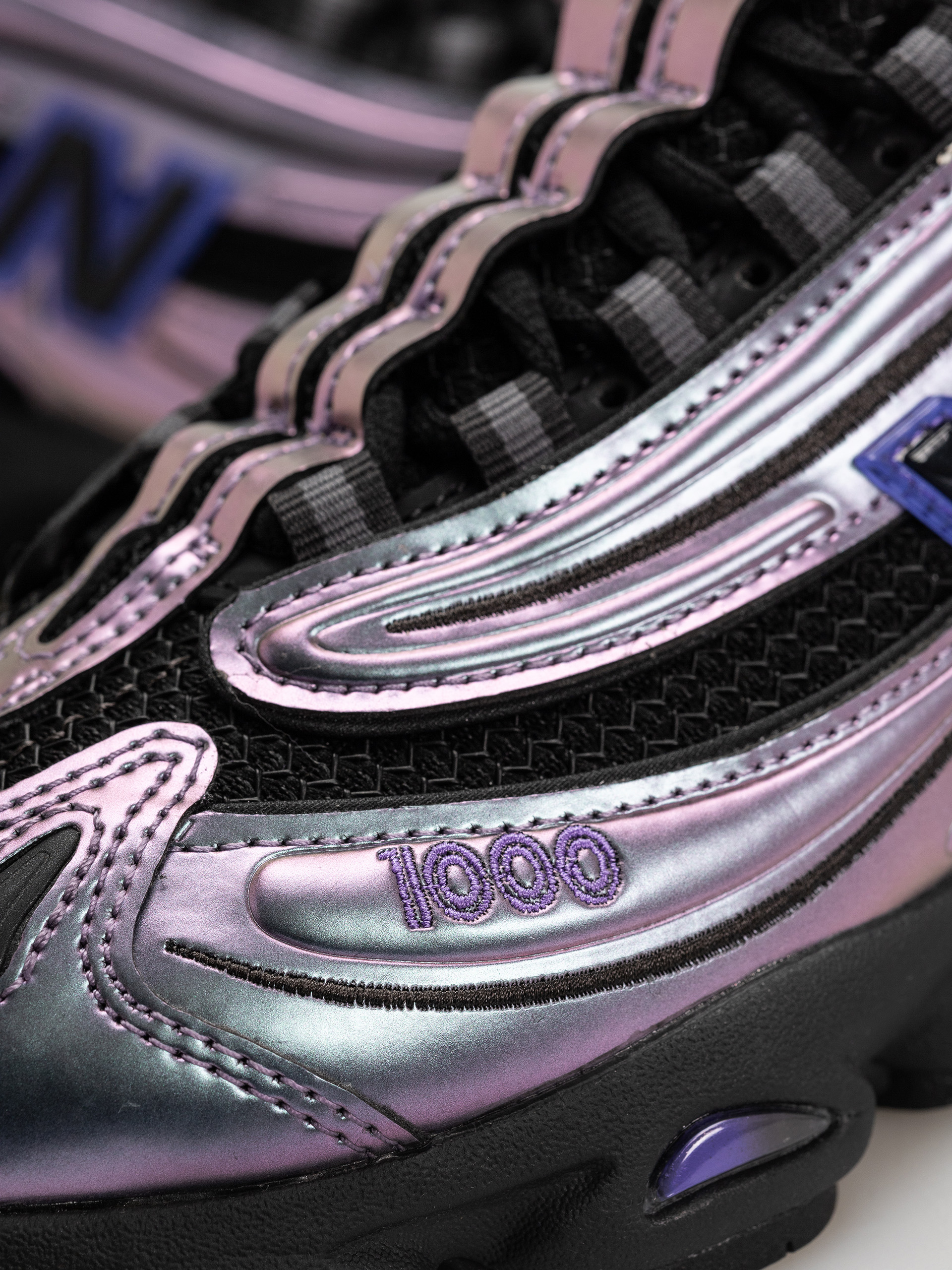 New Balance 1000 Cipők (faded black/electric indigo)