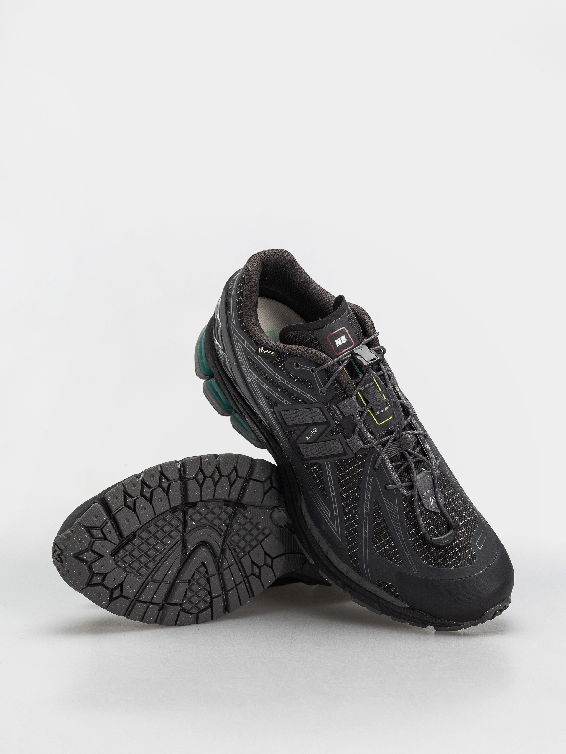 New Balance 1906 Cipők (castlerock/faded black)