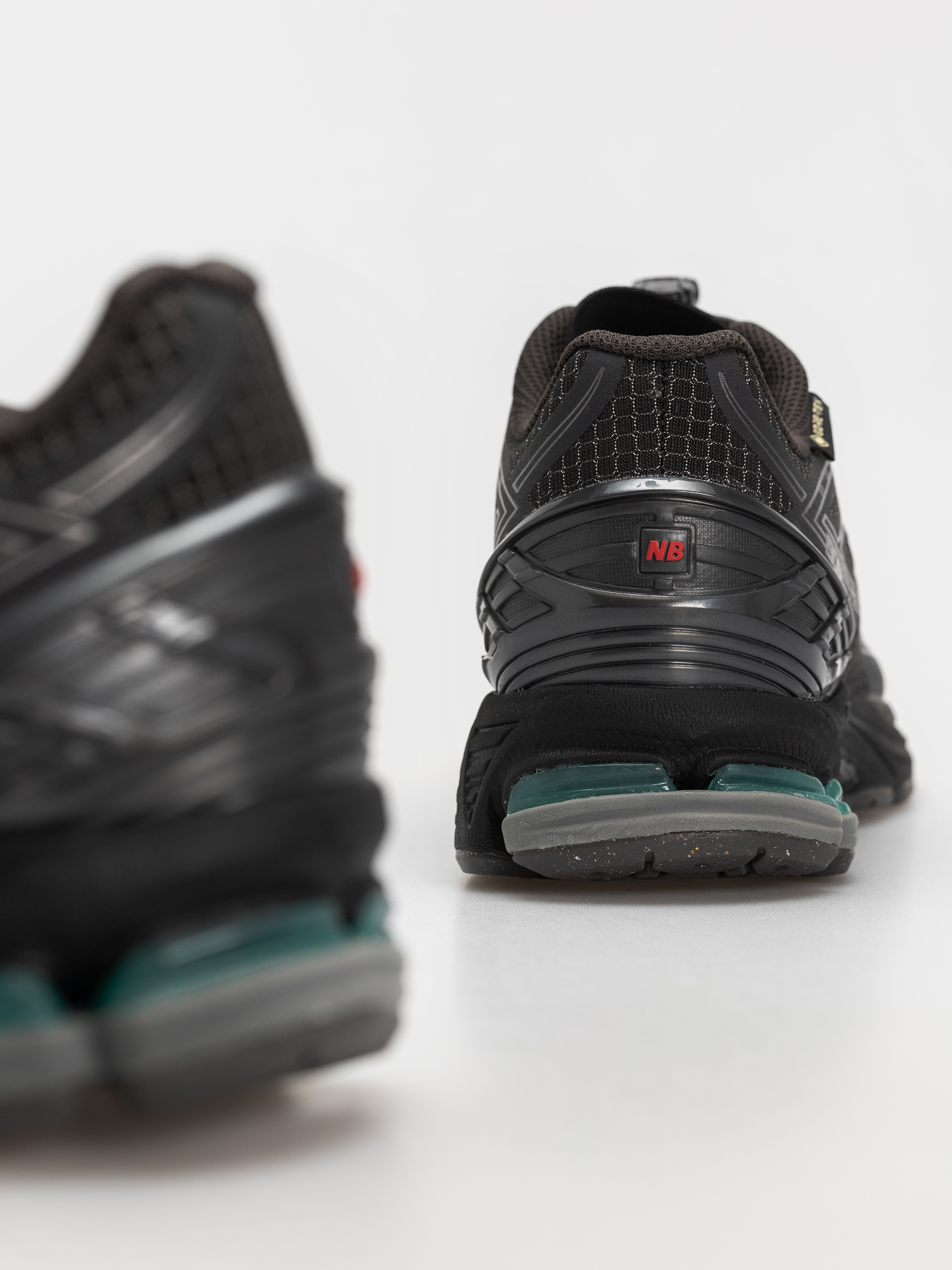 New Balance 1906 Cipők (castlerock/faded black)