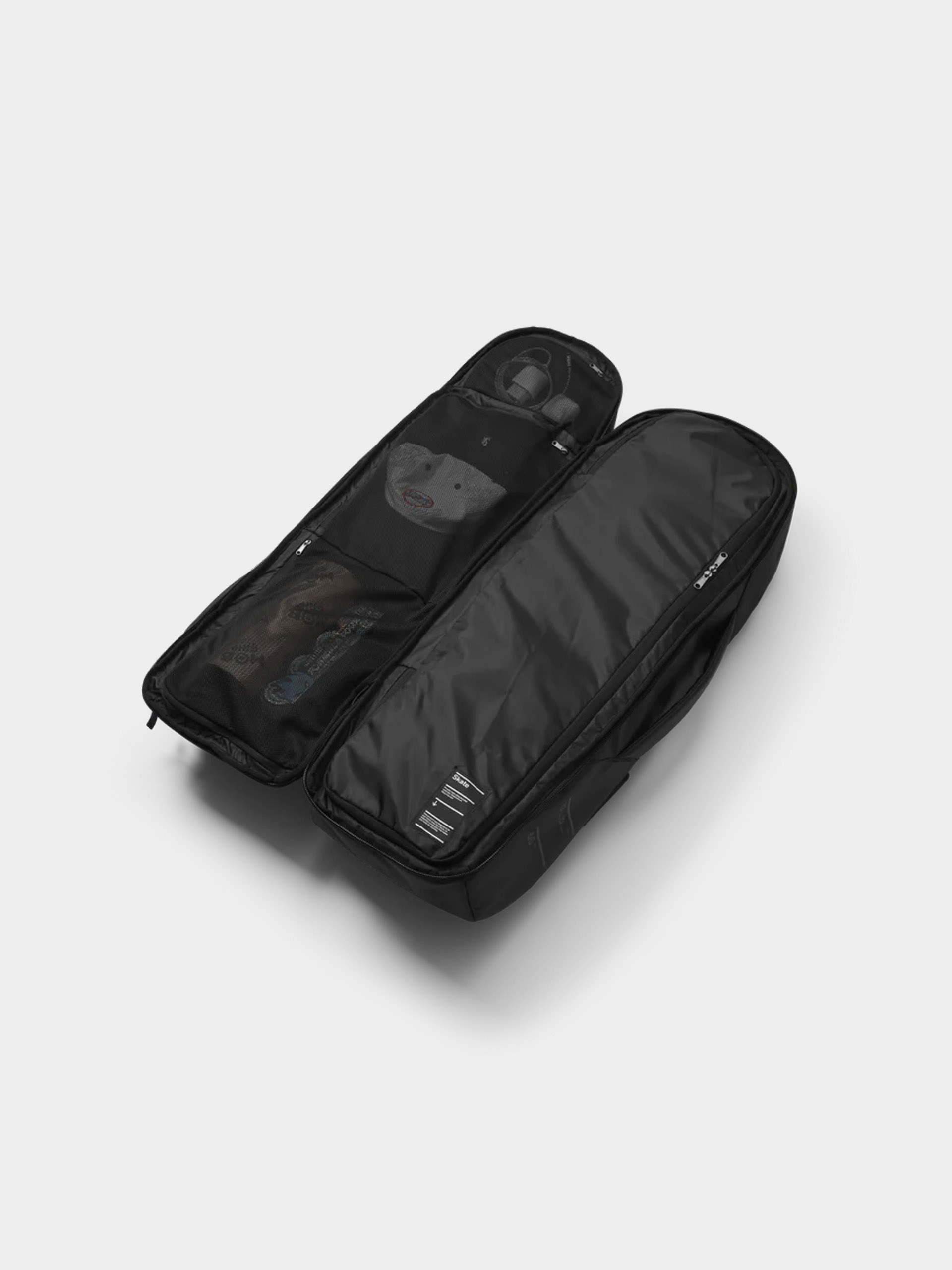 Hátizsák Db Skateboarding Pro Travel Pack 65L (black out)