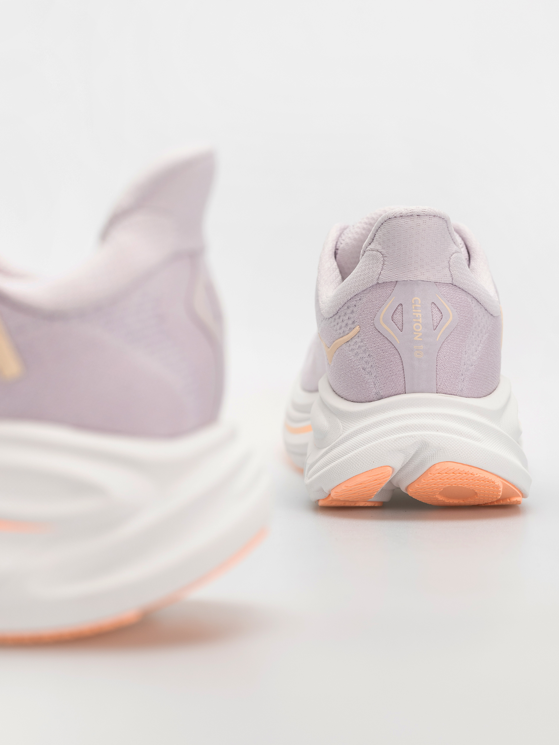 Hoka Clifton 10 Wmn Cipők (lilac cream/tangerine glow)