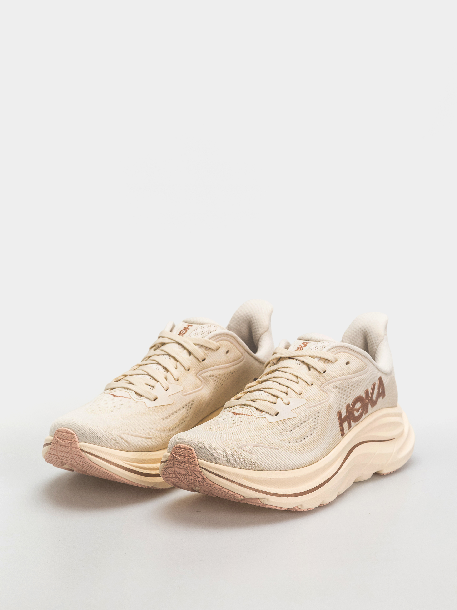 Hoka Clifton 10 Wmn Cipők (alabaster/rose gold)