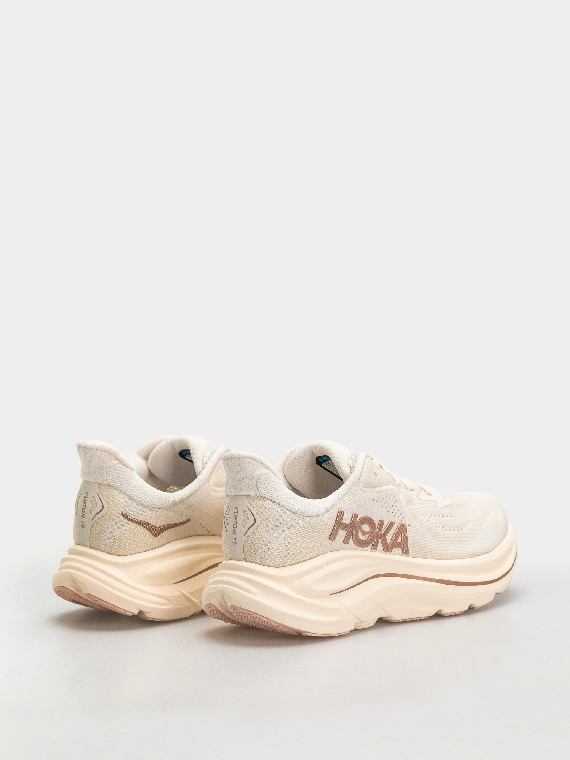 Hoka Clifton 10 Wmn Cipők (alabaster/rose gold)