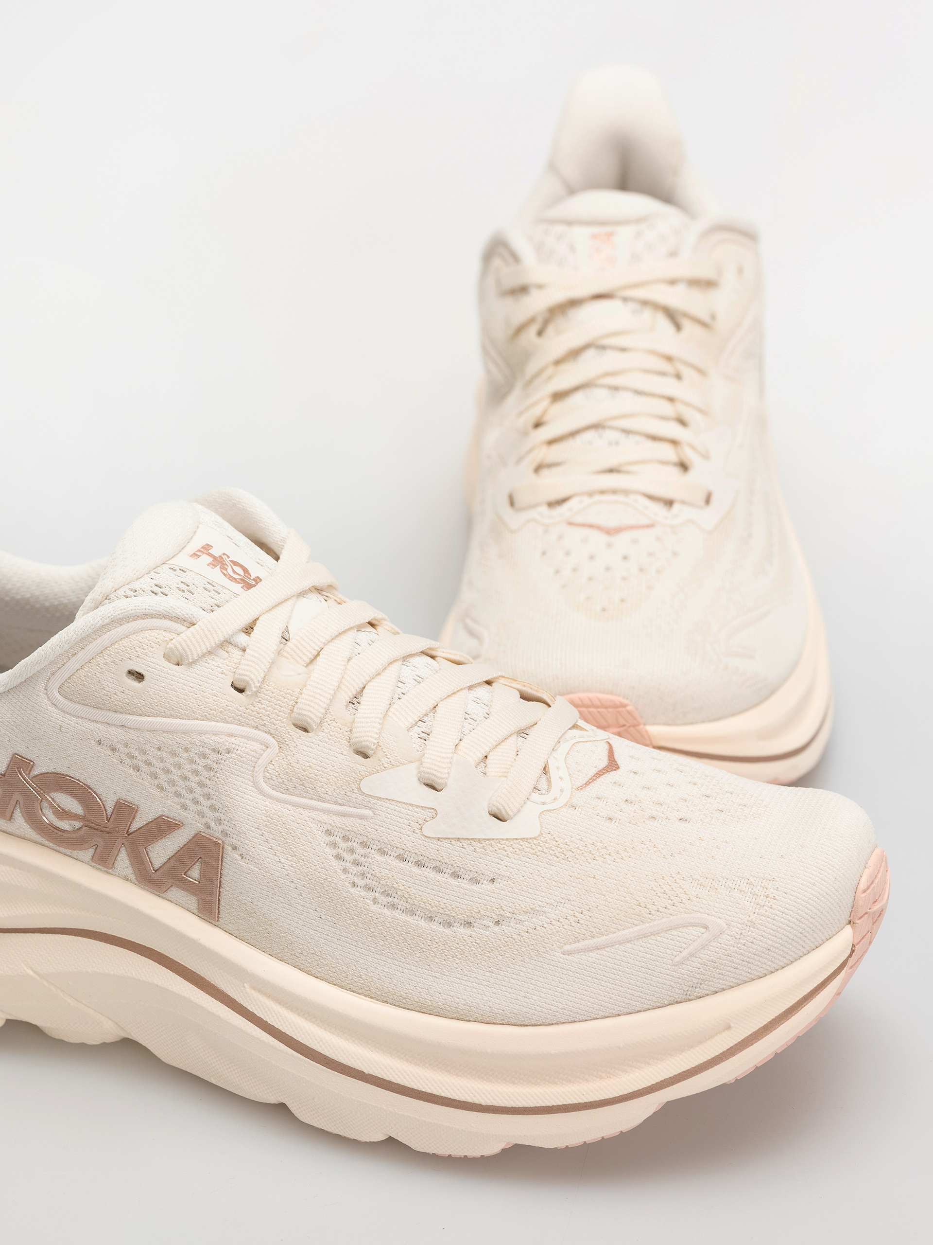 Hoka Clifton 10 Wmn Cipők (alabaster/rose gold)