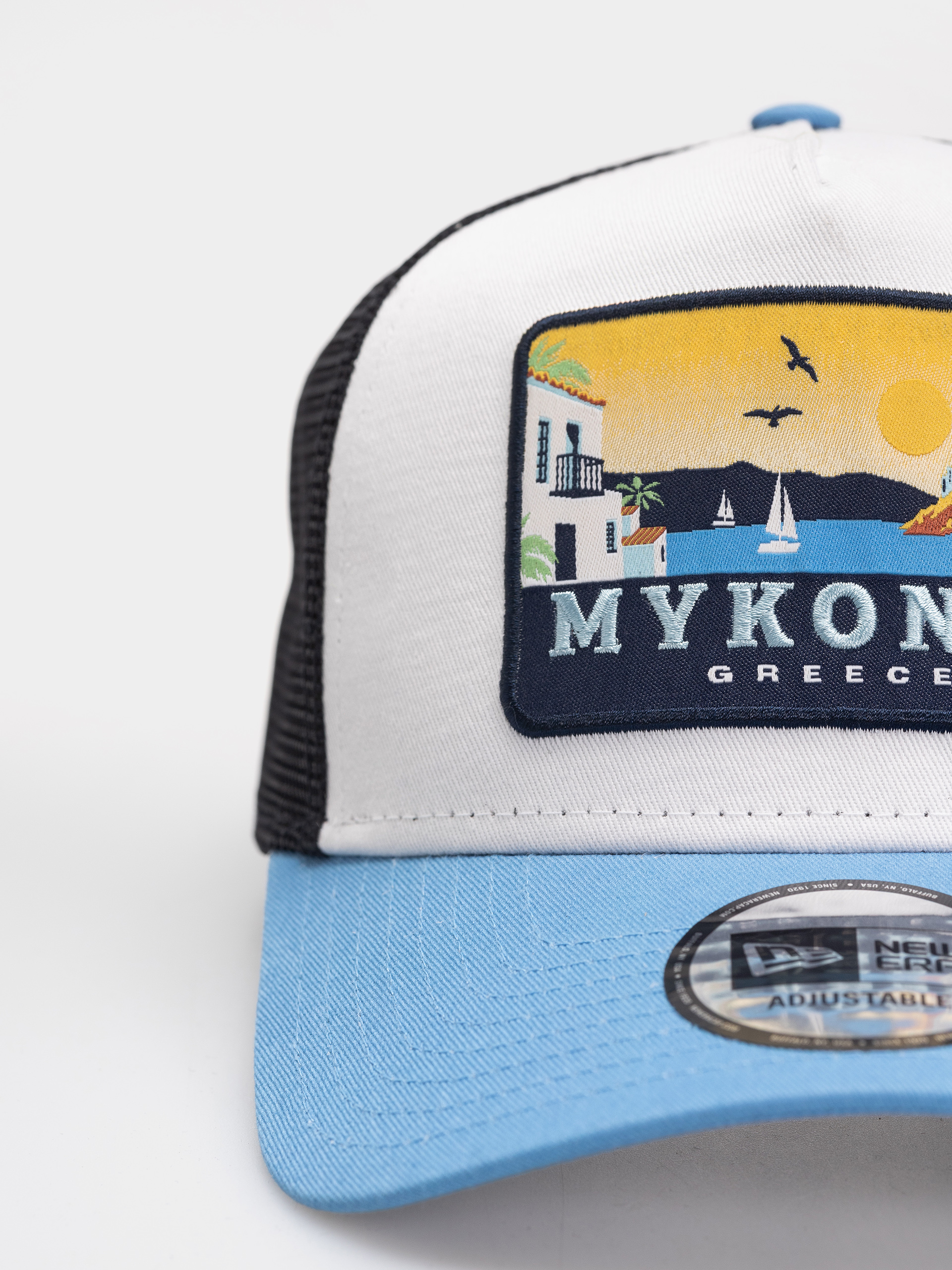 Baseball sapka New Era Location Patch Trucker (blue/white)