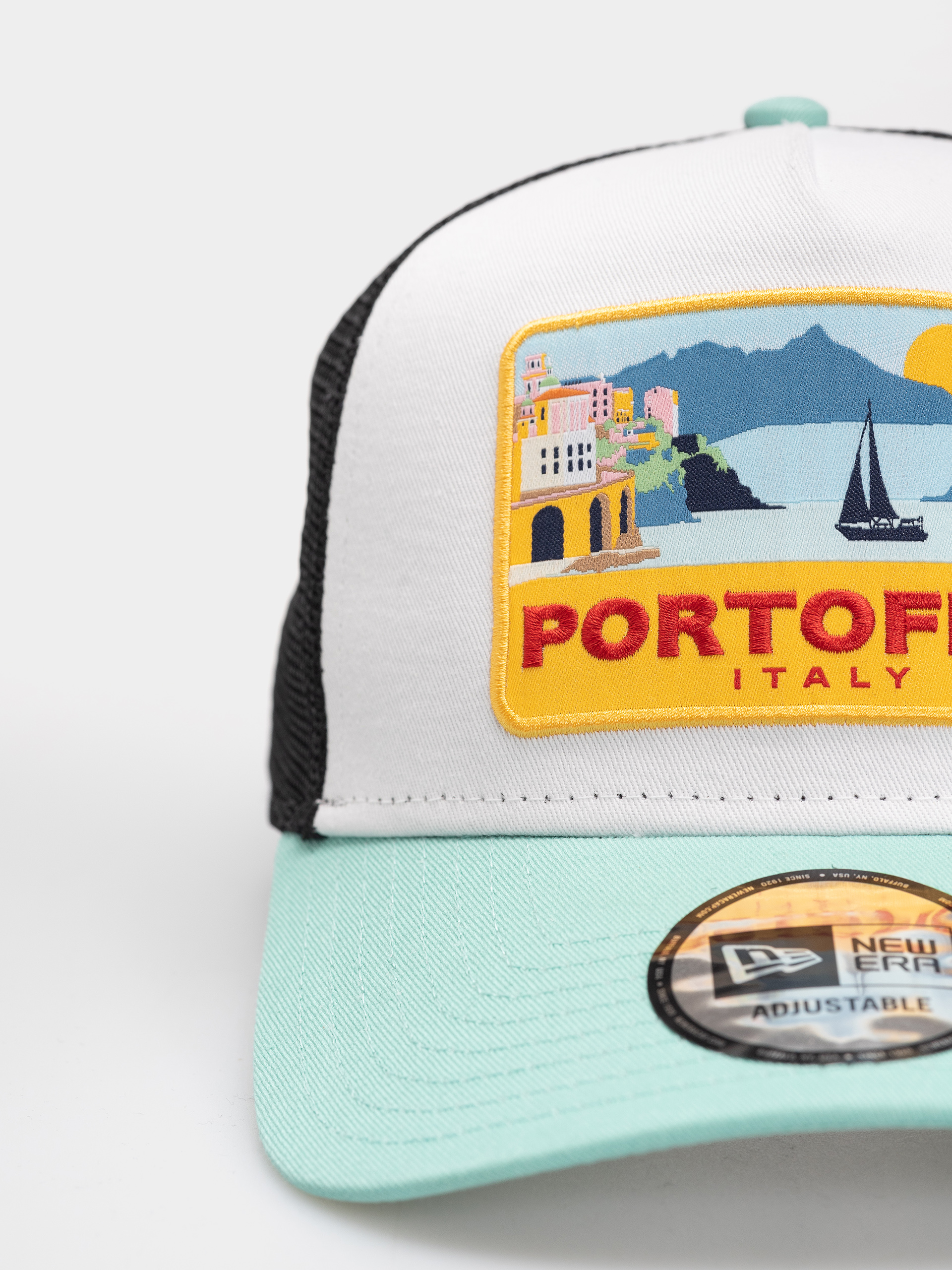 Baseball sapka New Era Location Patch Trucker (green/white)