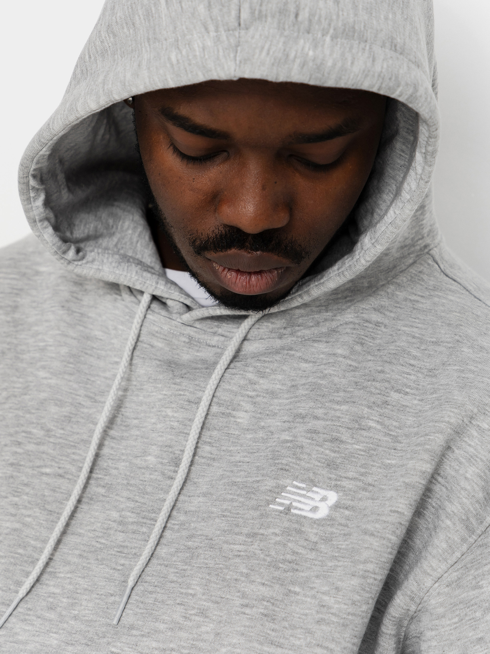 New Balance Sport Essentials Fleece HD Kapucnis pulóver (athletic grey)